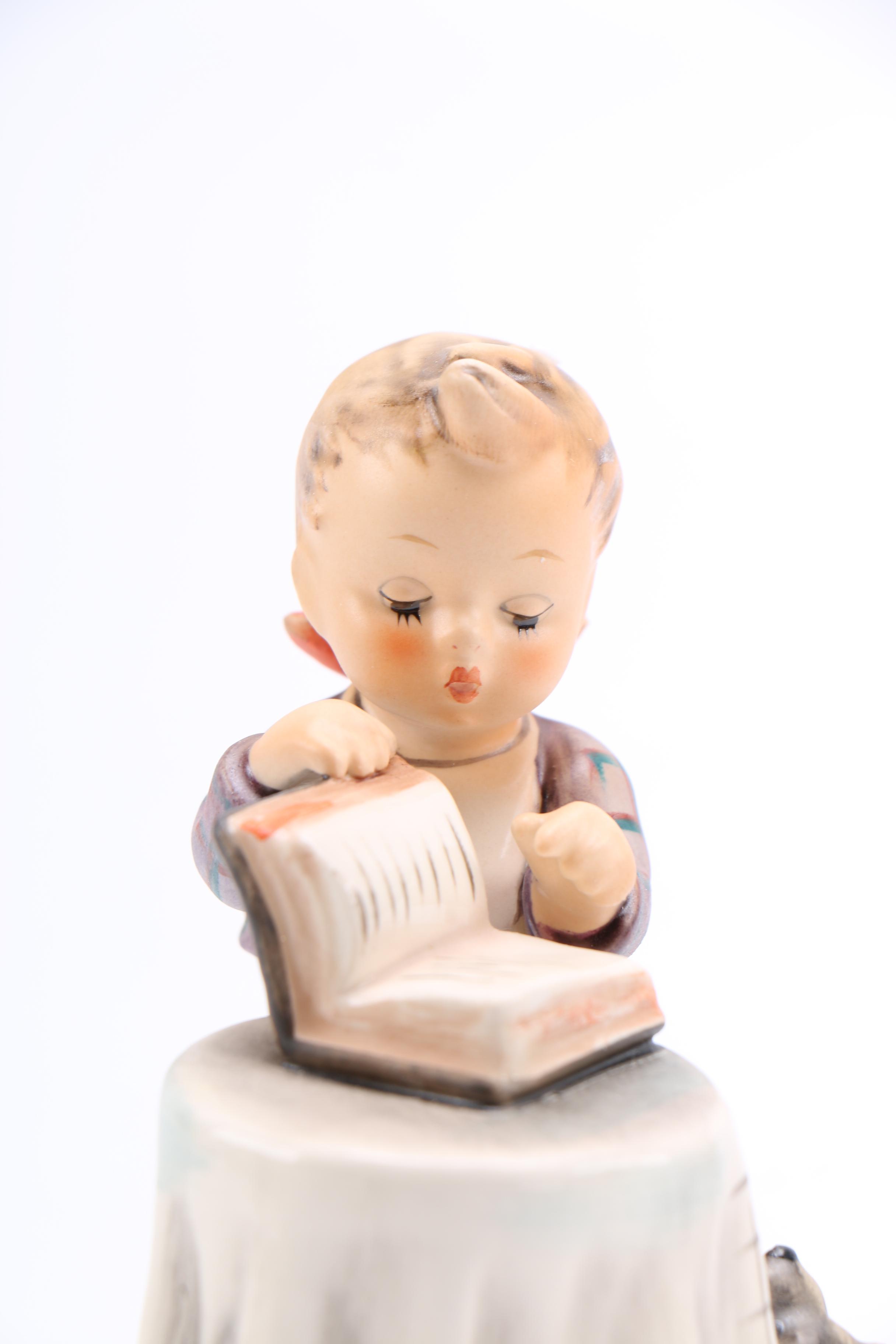 Goebel Hummel Porcelain Figurine of Child and Dog "Little Bookkeeper"