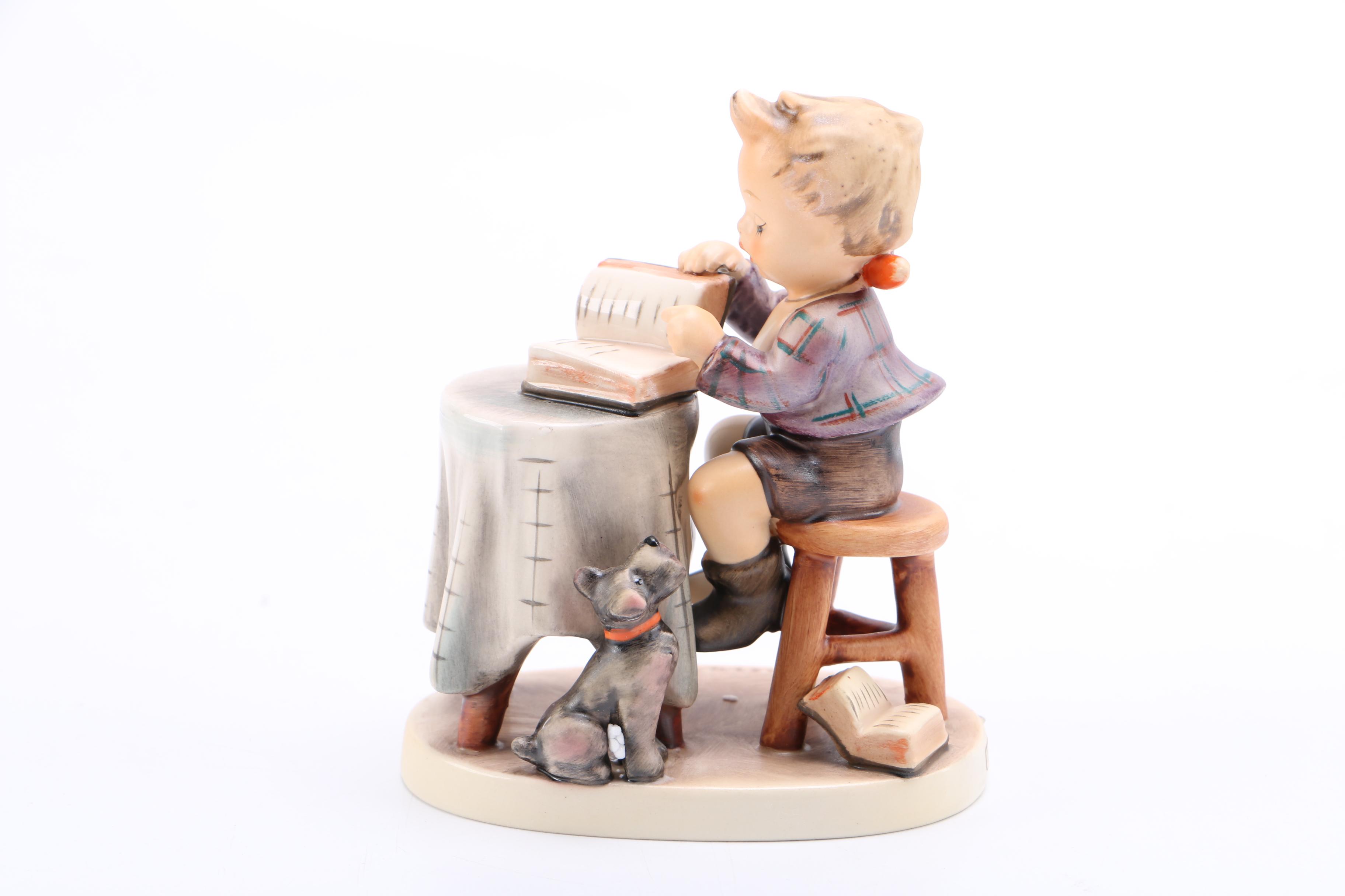 Goebel Hummel Porcelain Figurine of Child and Dog "Little Bookkeeper"