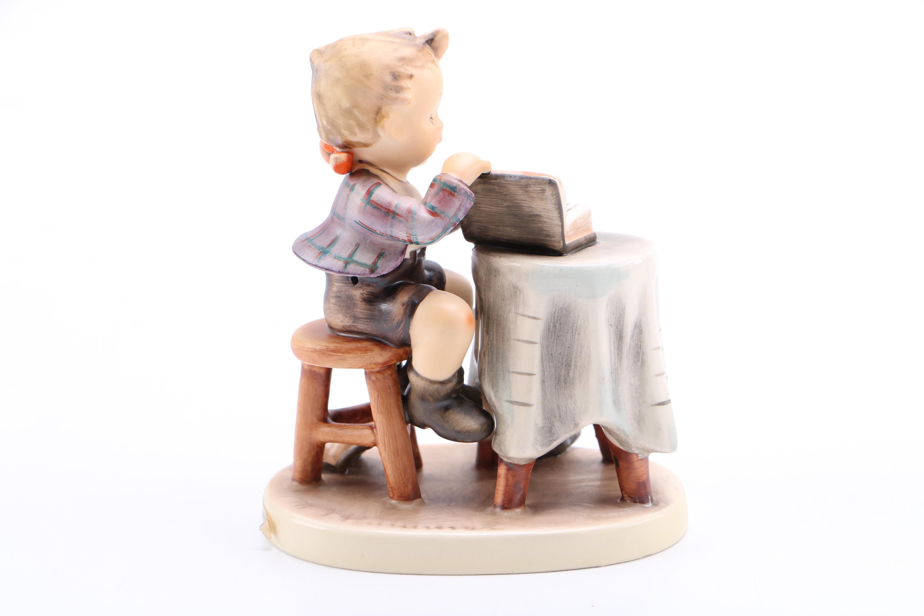 Goebel Hummel Porcelain Figurine of Child and Dog "Little Bookkeeper"