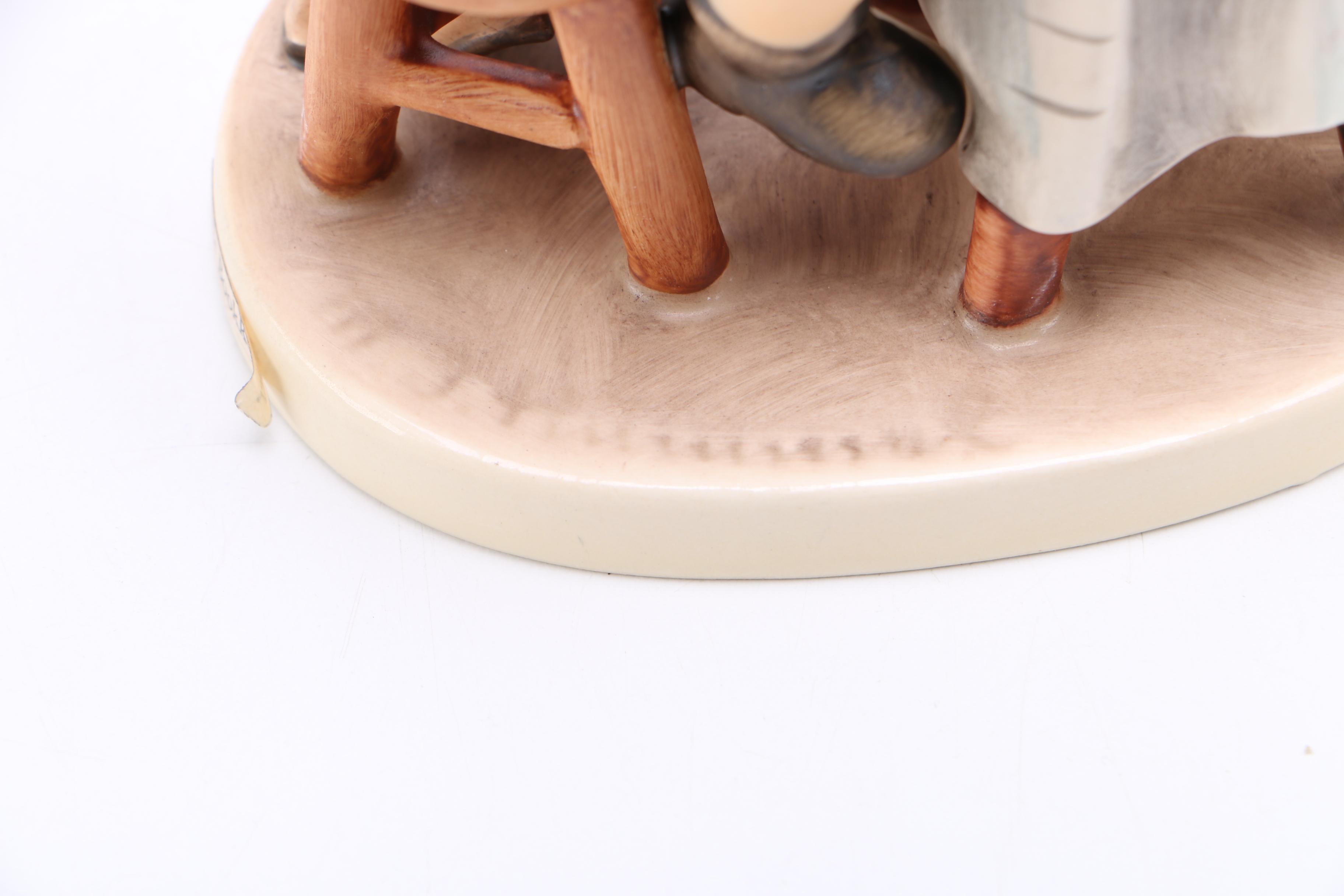 Goebel Hummel Porcelain Figurine of Child and Dog "Little Bookkeeper"