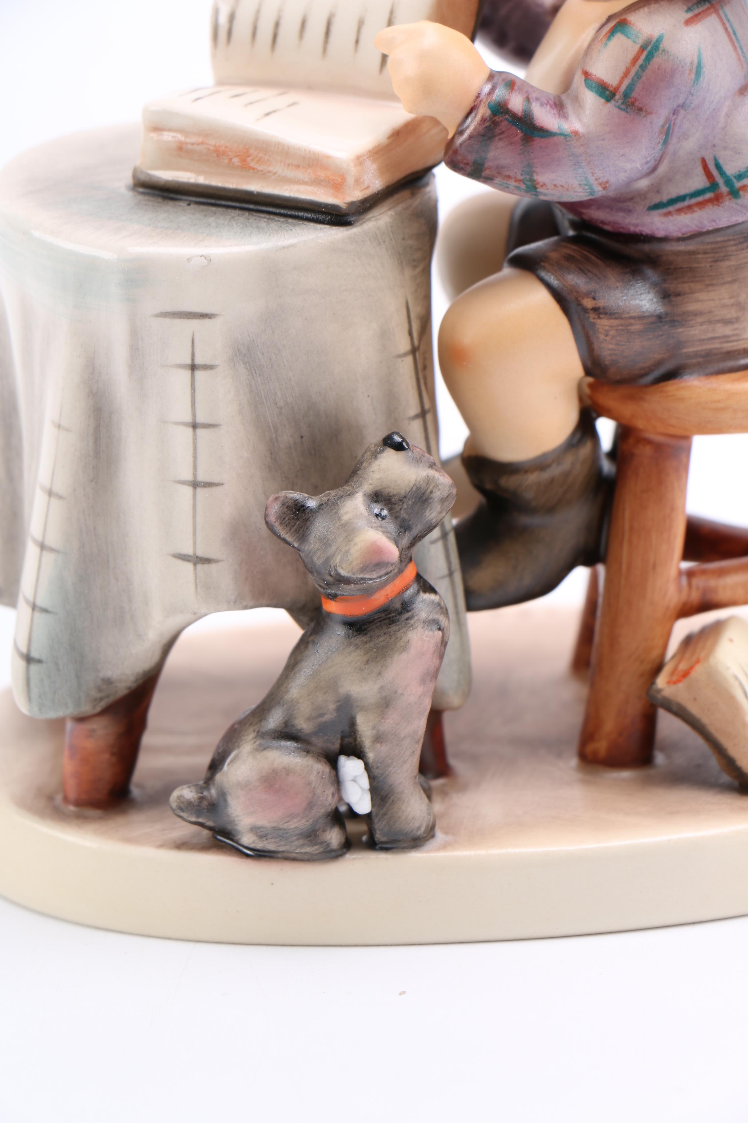 Goebel Hummel Porcelain Figurine of Child and Dog "Little Bookkeeper"