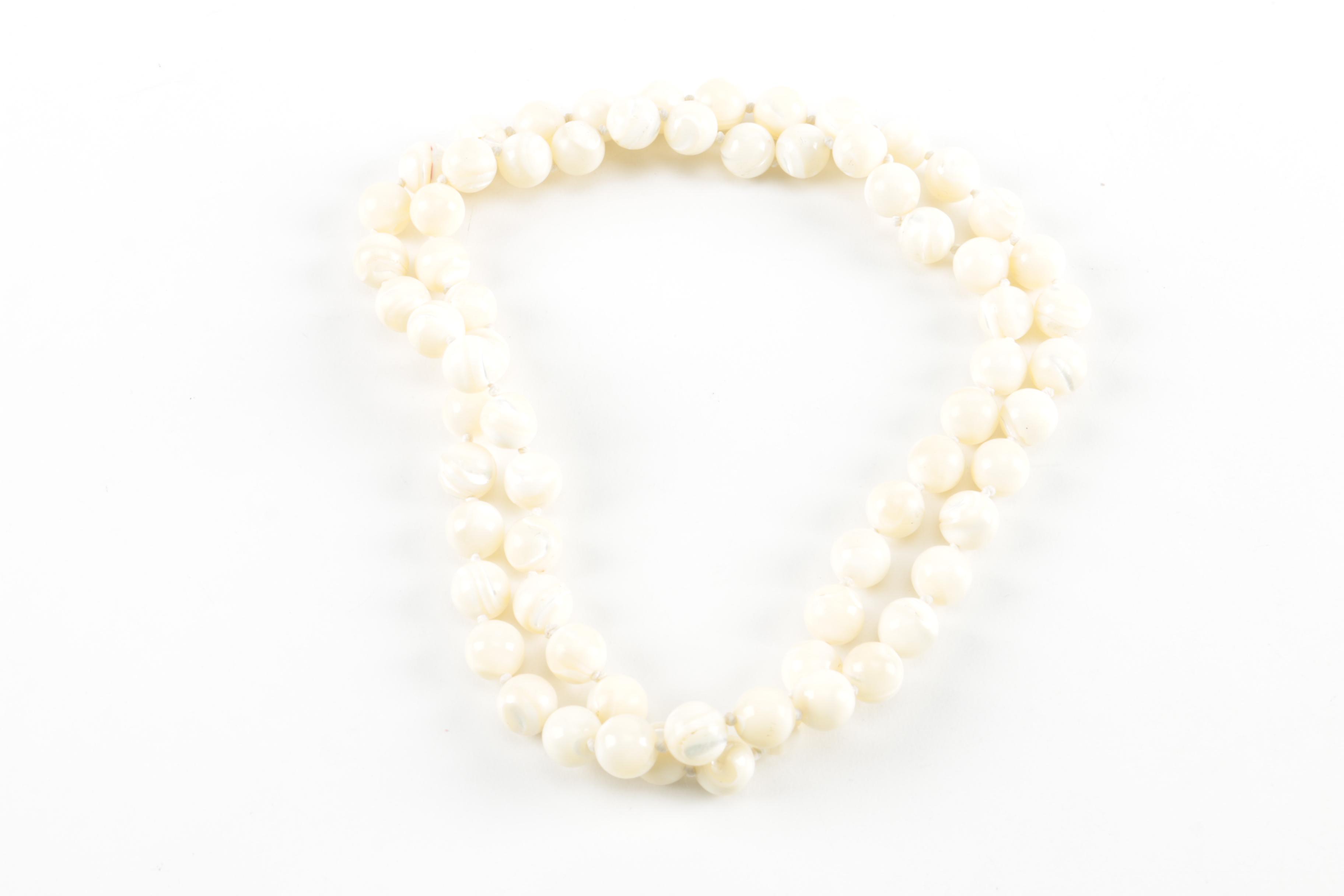 Costume Shell and Coral Necklaces With Rings