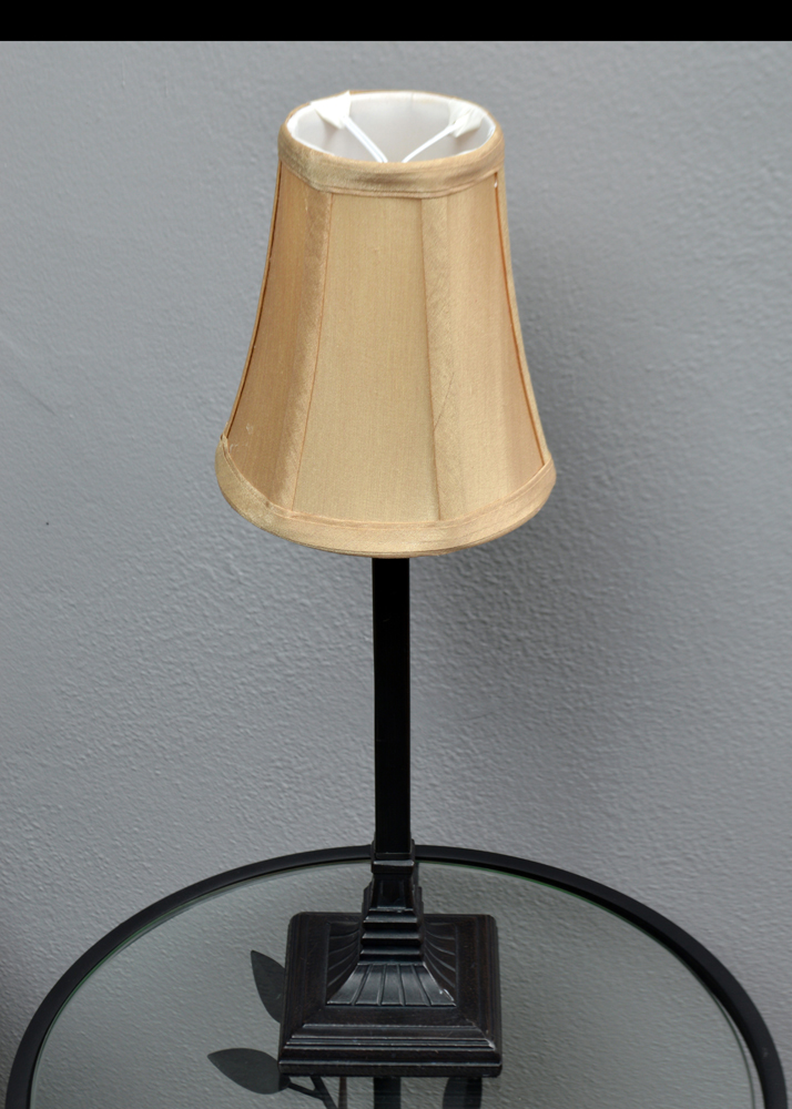 Contemporary Ladderback Armchair With Accent Table and Lamp