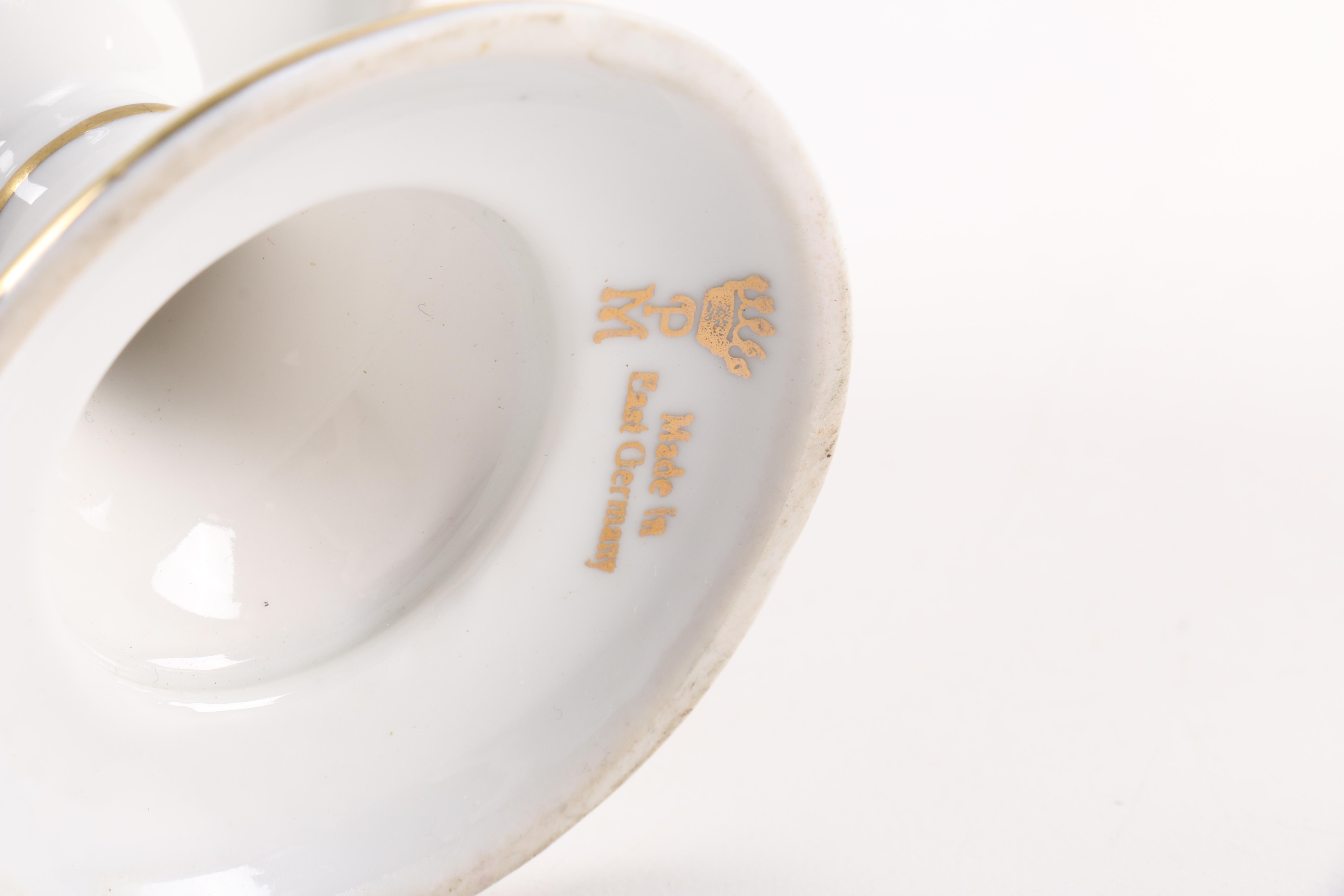Vintage Ceramic Serviceware With Floral Motifs
