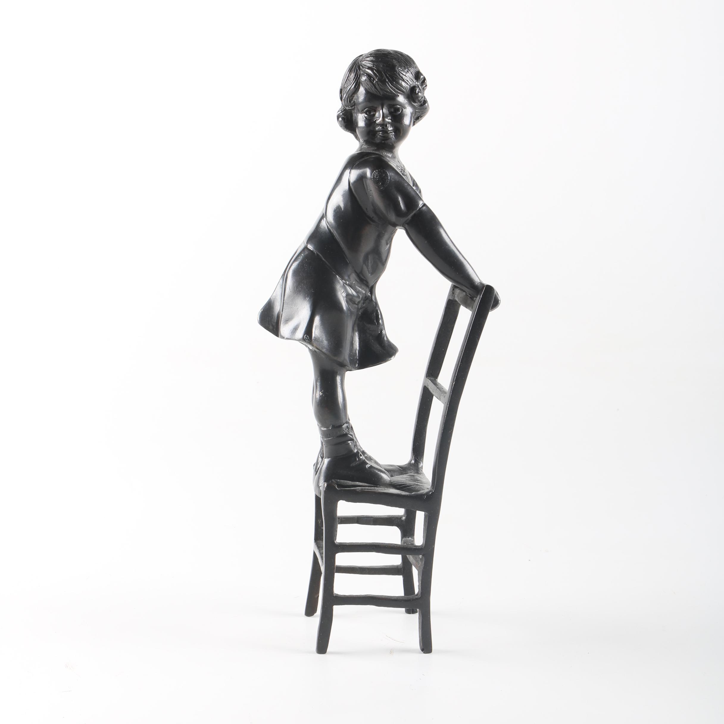 Bronze Child on Chair Figurine