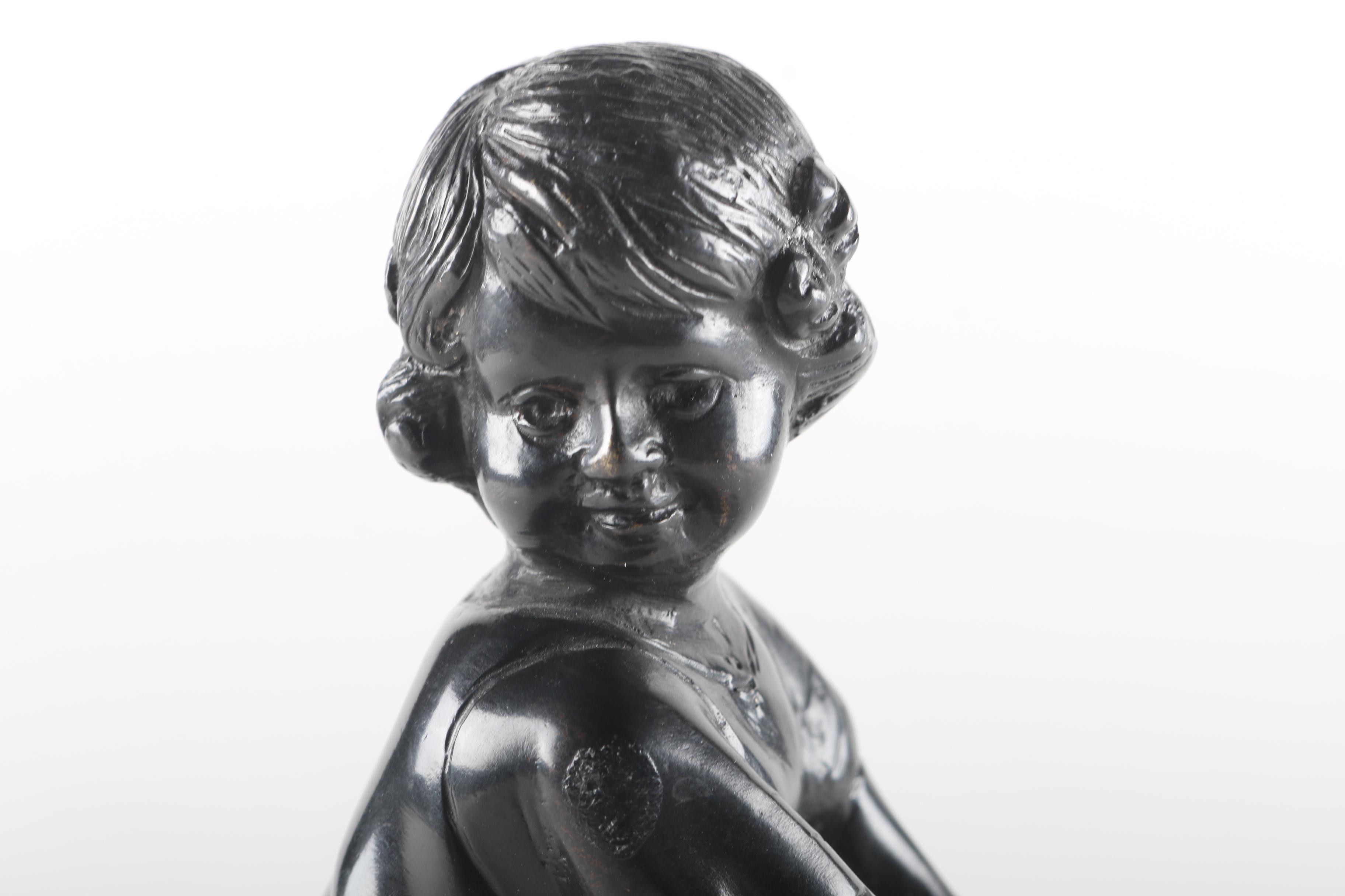 Bronze Child on Chair Figurine