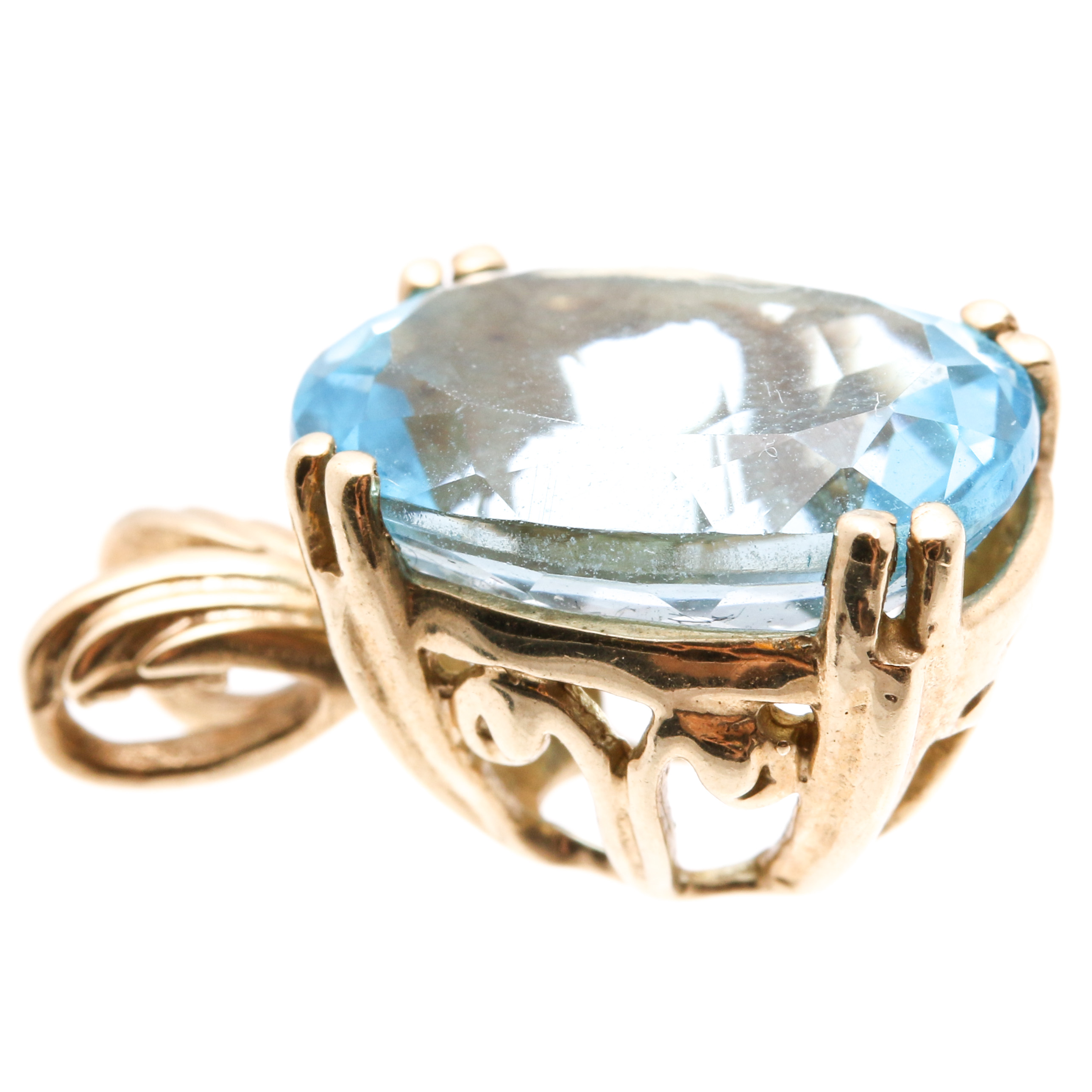 10K Yellow Gold 6.97 CT Blue Topaz Pendant