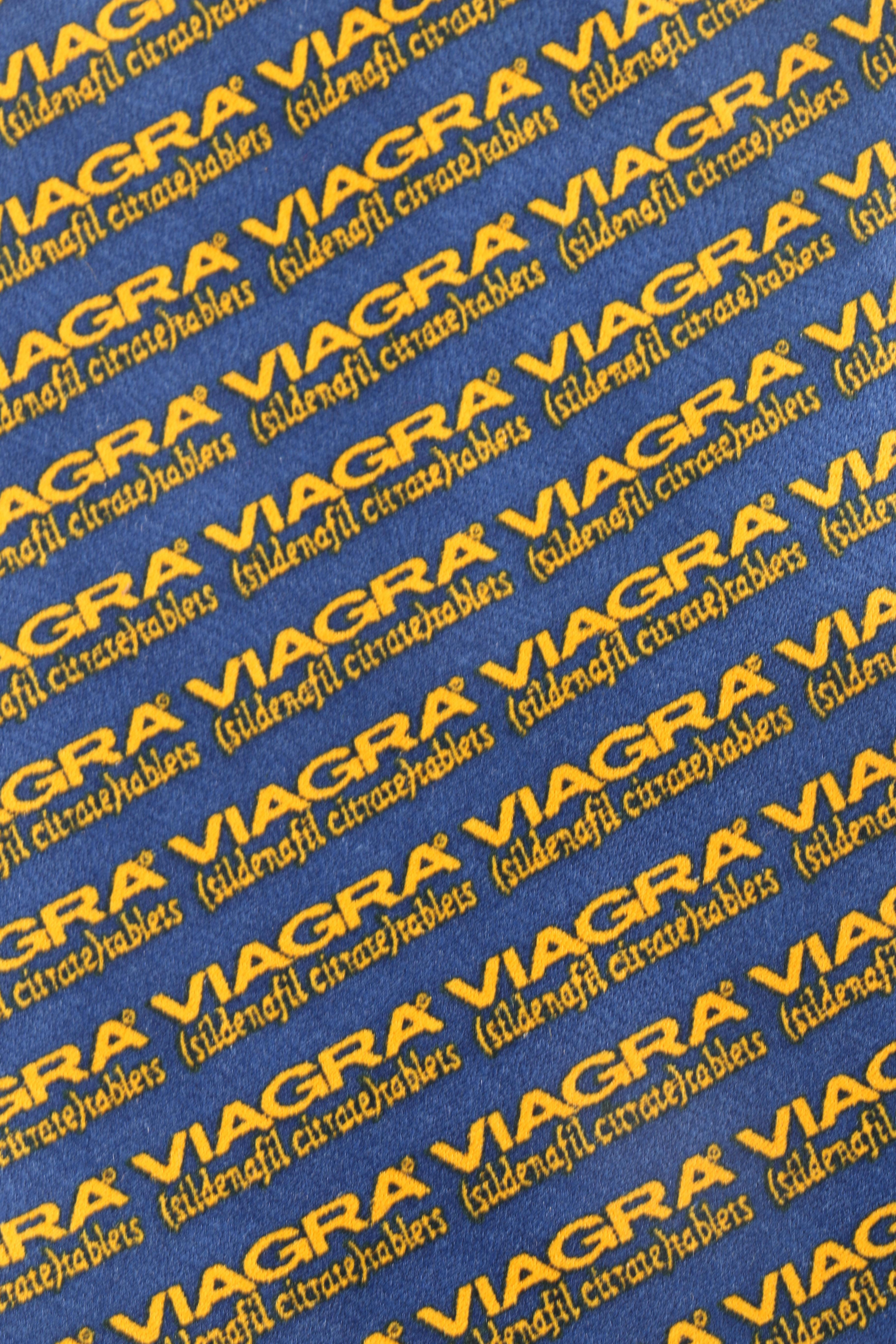 Assorted Neckties Including Viagra and Golden Toilets