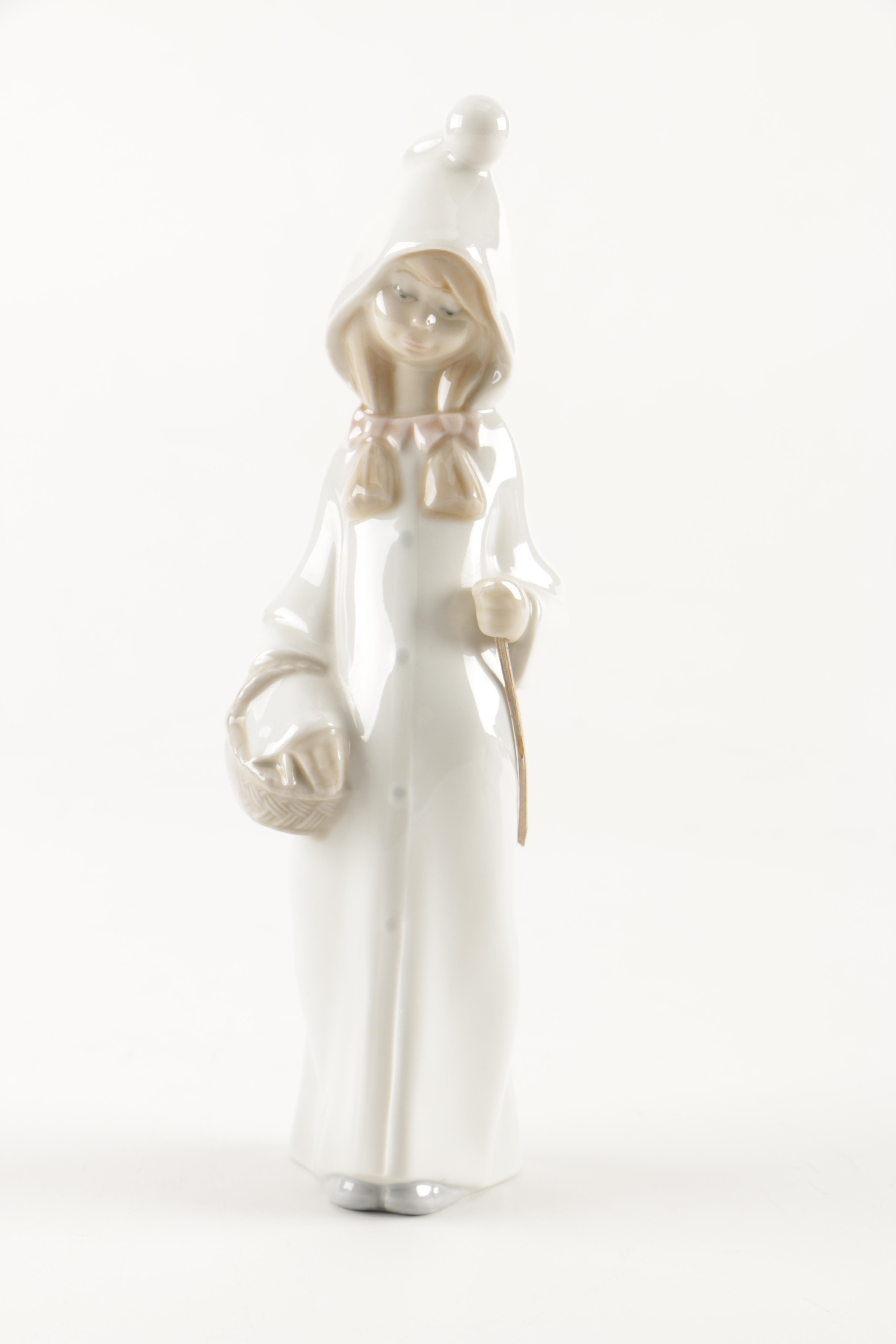 Two Lladró "Shepherd Girl with Basket" Porcelain Figurines