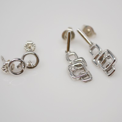 Two Pair of Sterling Silver Diamond Pierced Earrings
