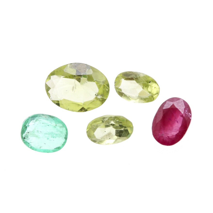 Assortment of Loose Gemstones featuring Ruby, Peridot, and Emerald