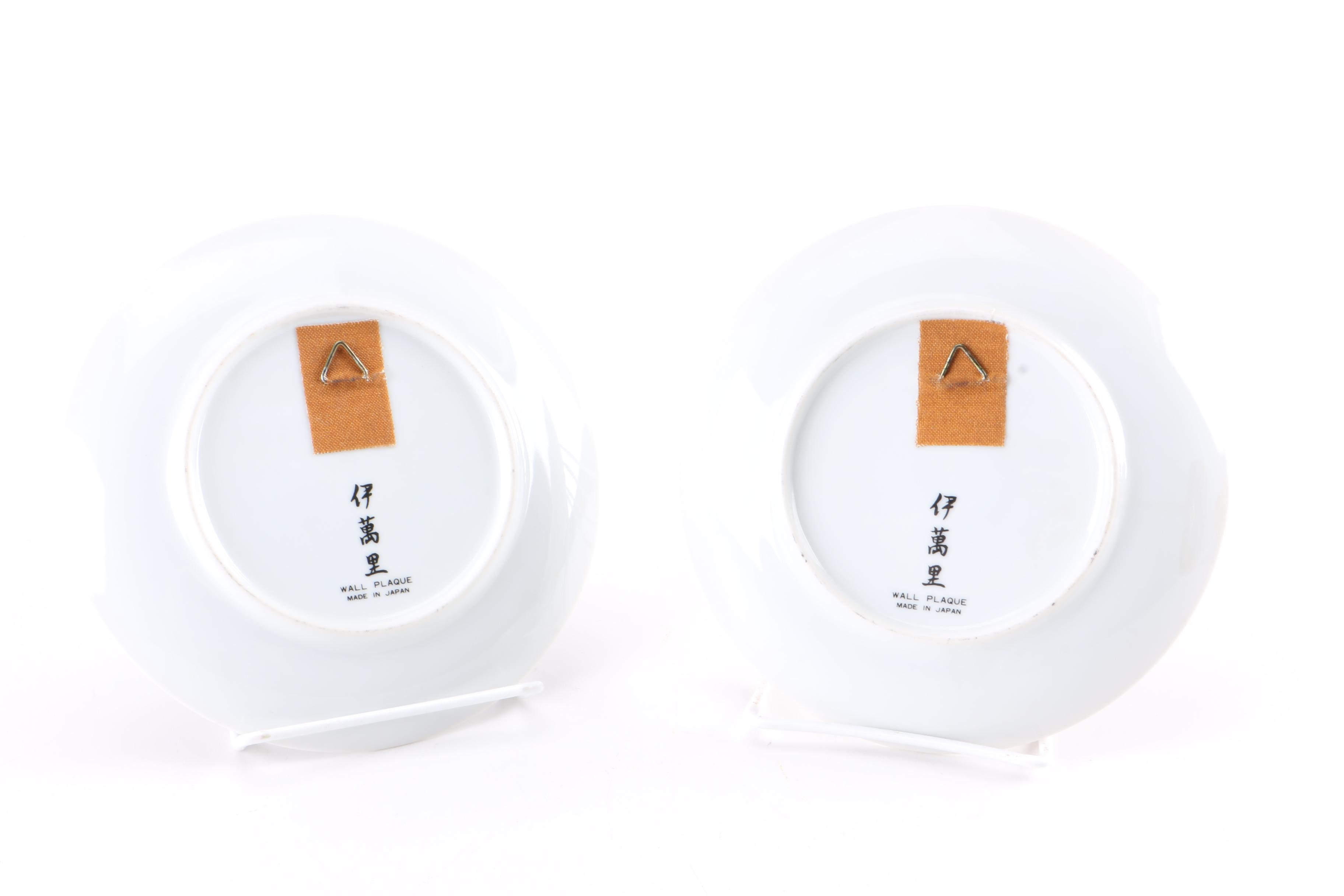 Assortment of Asian Themed Plates and Stands