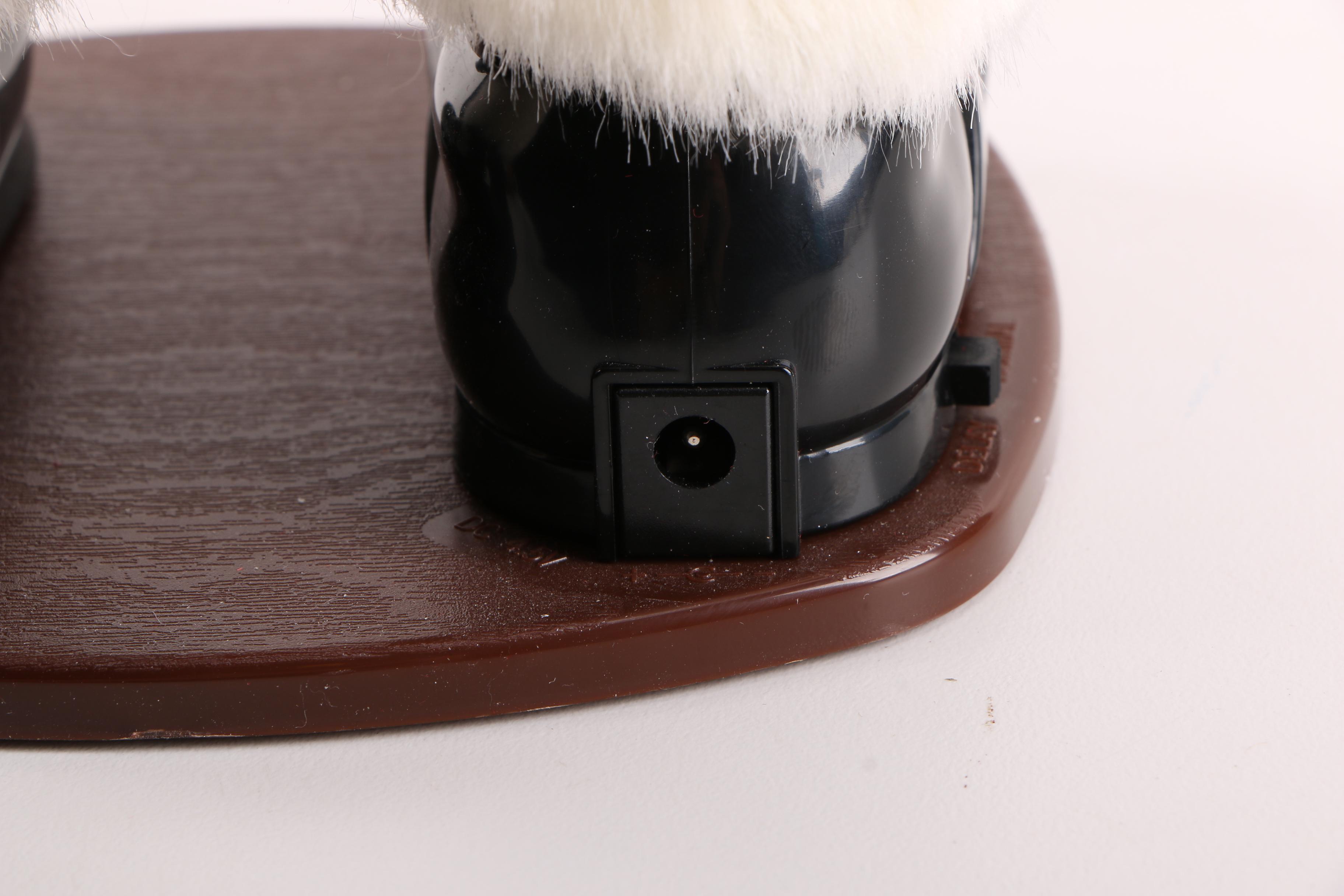 Jingle Bell Rock Santa Figurine