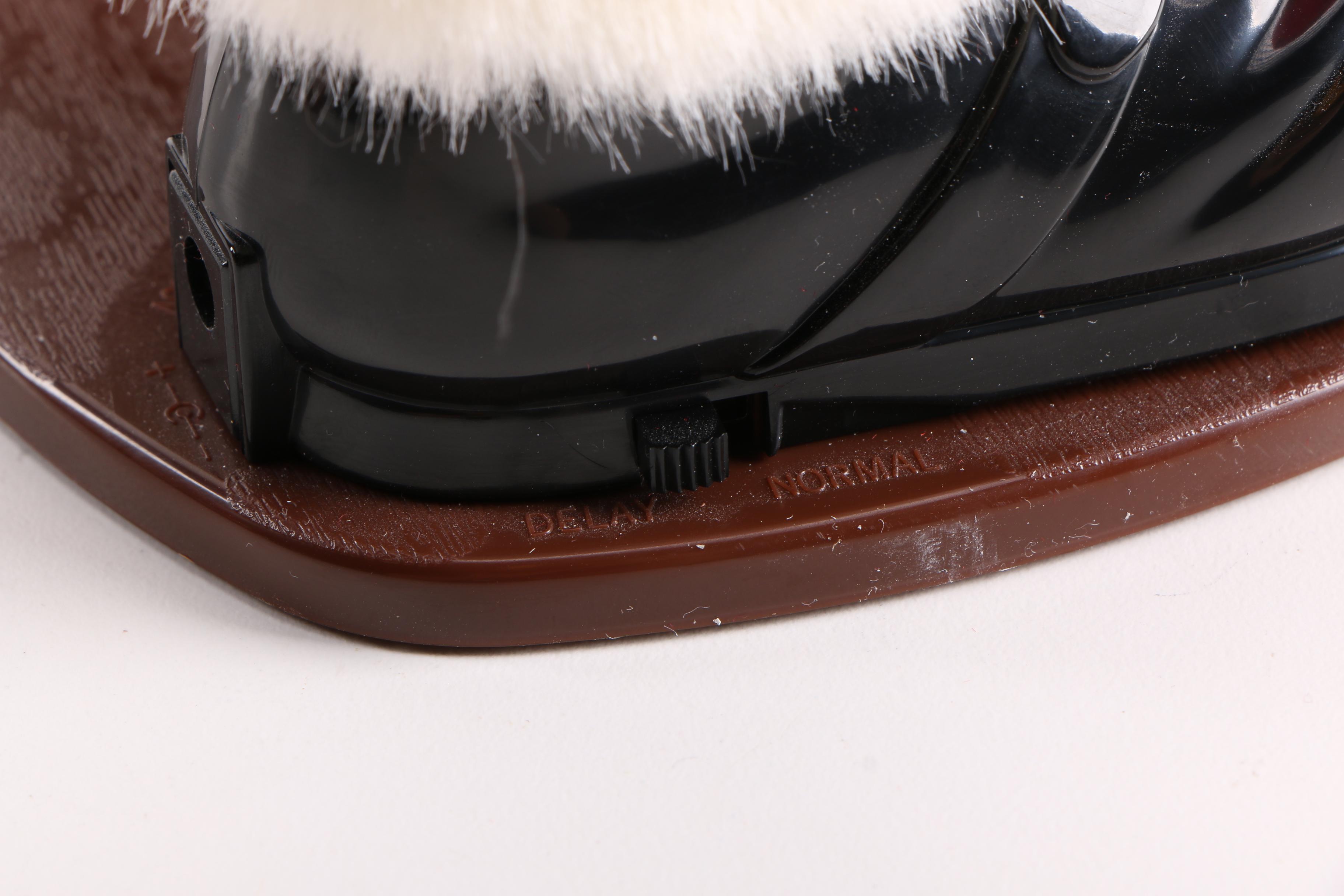 Jingle Bell Rock Santa Figurine