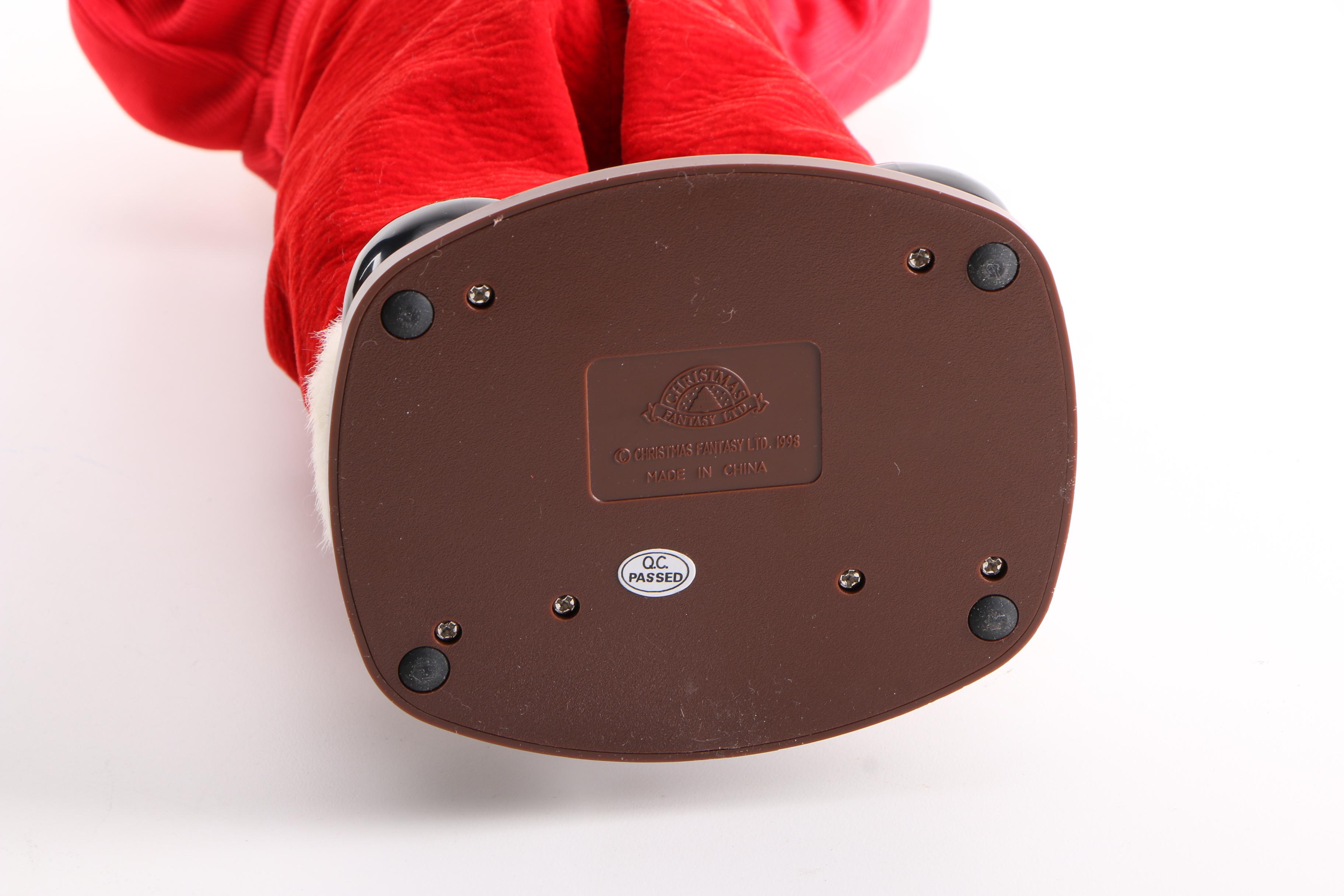 Jingle Bell Rock Santa Figurine