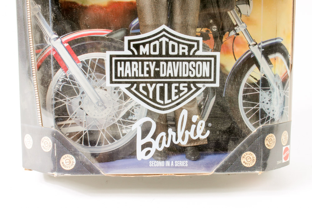 Three Harley-Davidson Edition Mattel Barbie® and Ken® Dolls