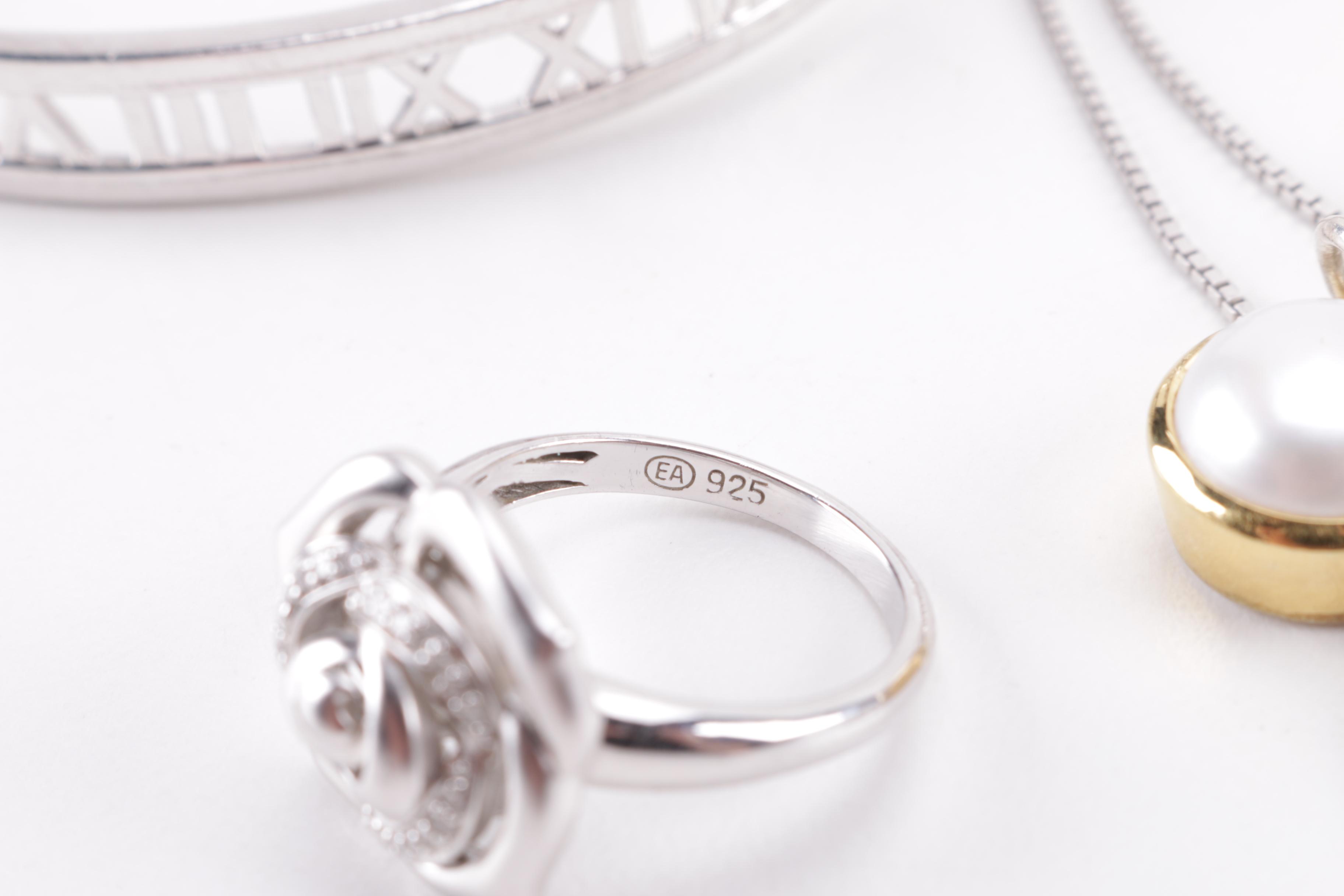 Sterling Silver Jewelry Including a Diamond Ring