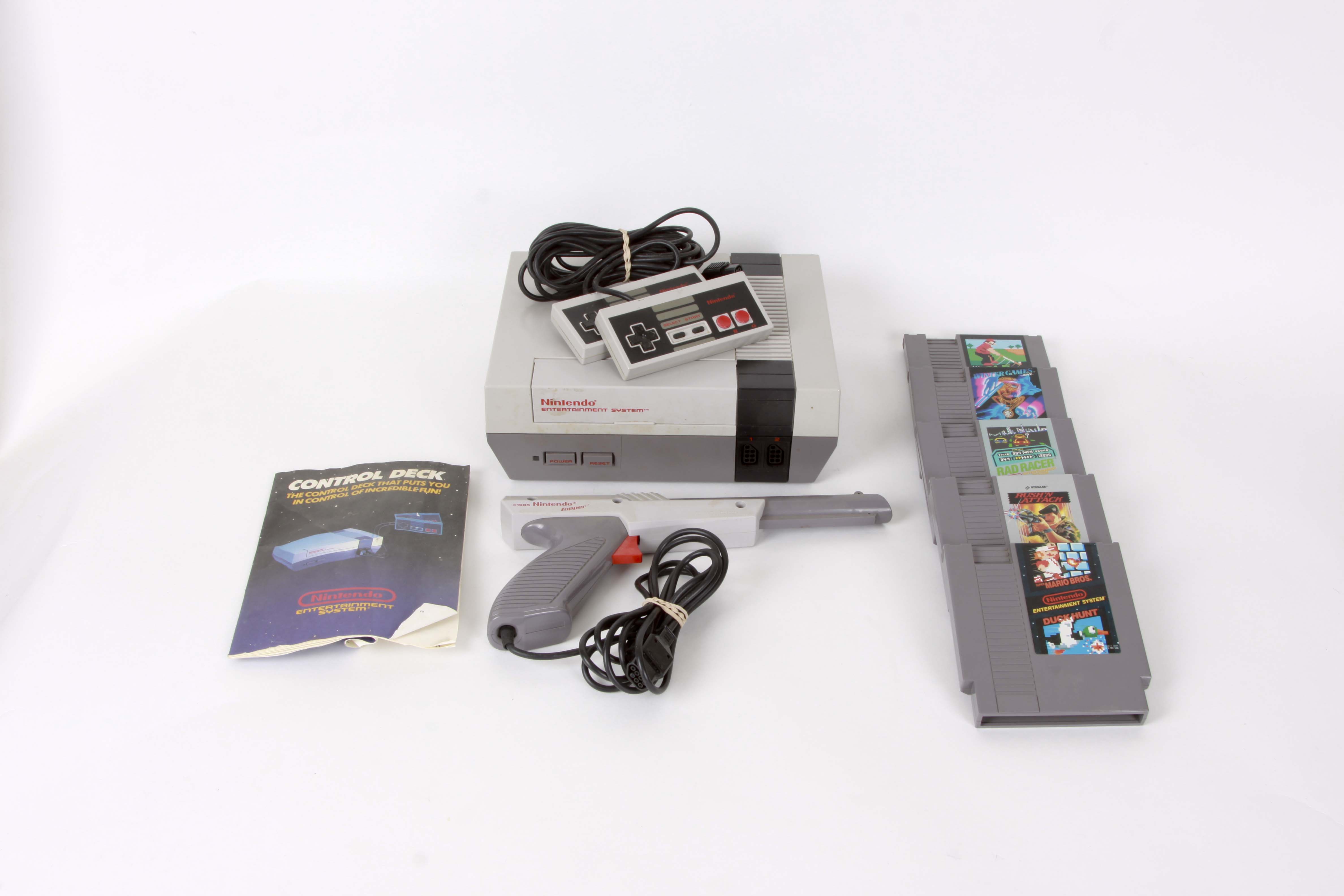 Vintage Nintendo NES System with Controllers and Games