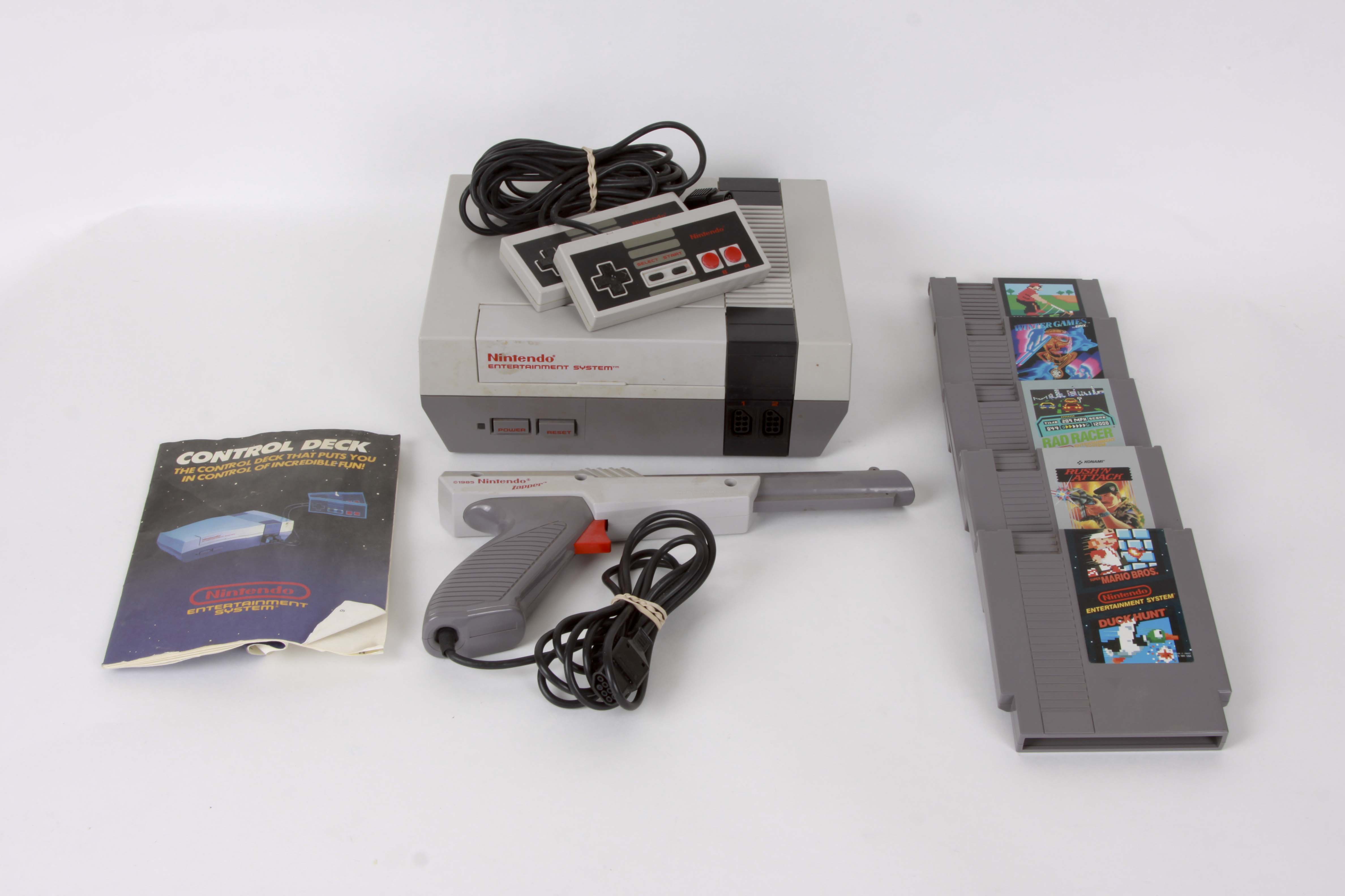 Vintage Nintendo NES System with Controllers and Games