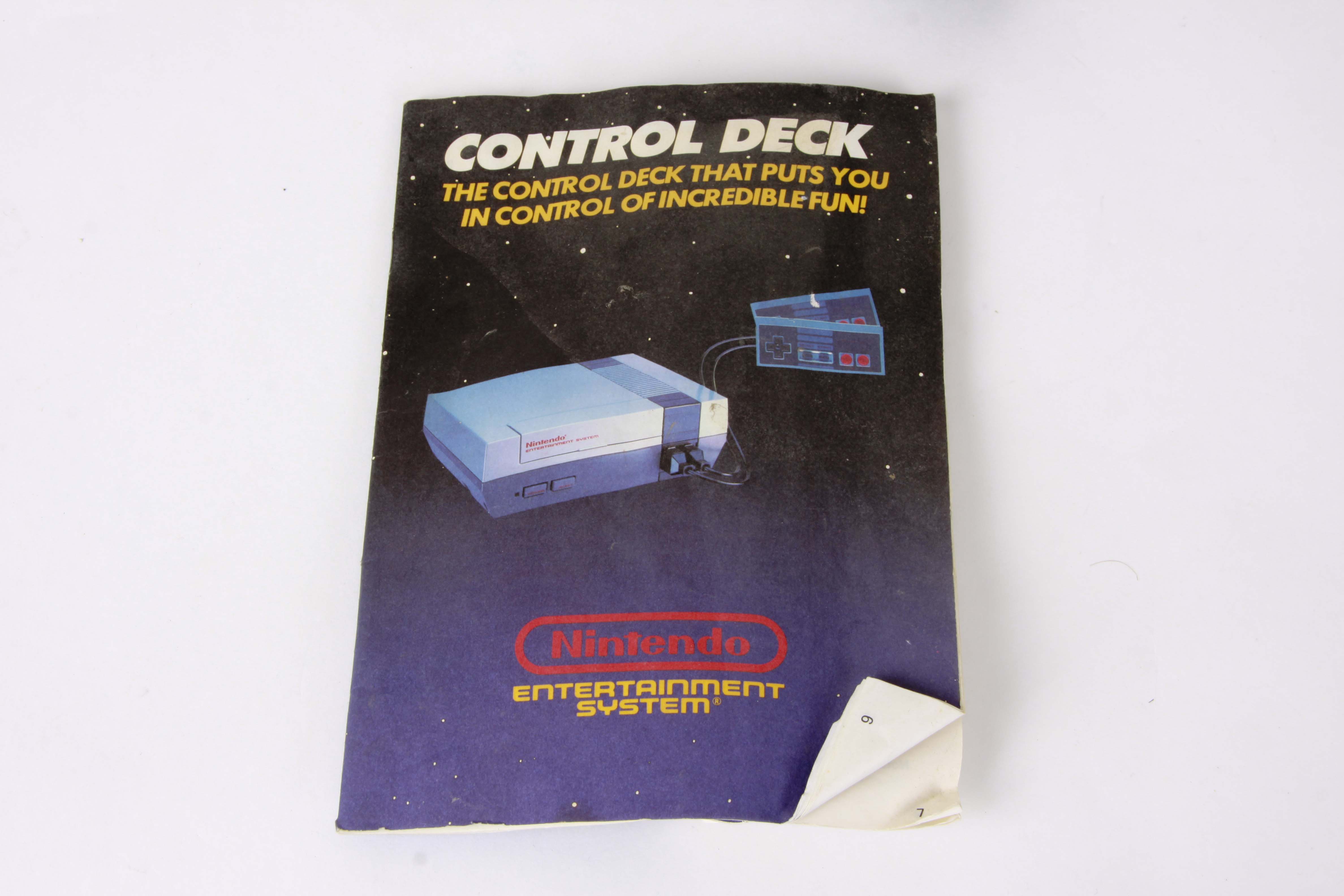 Vintage Nintendo NES System with Controllers and Games