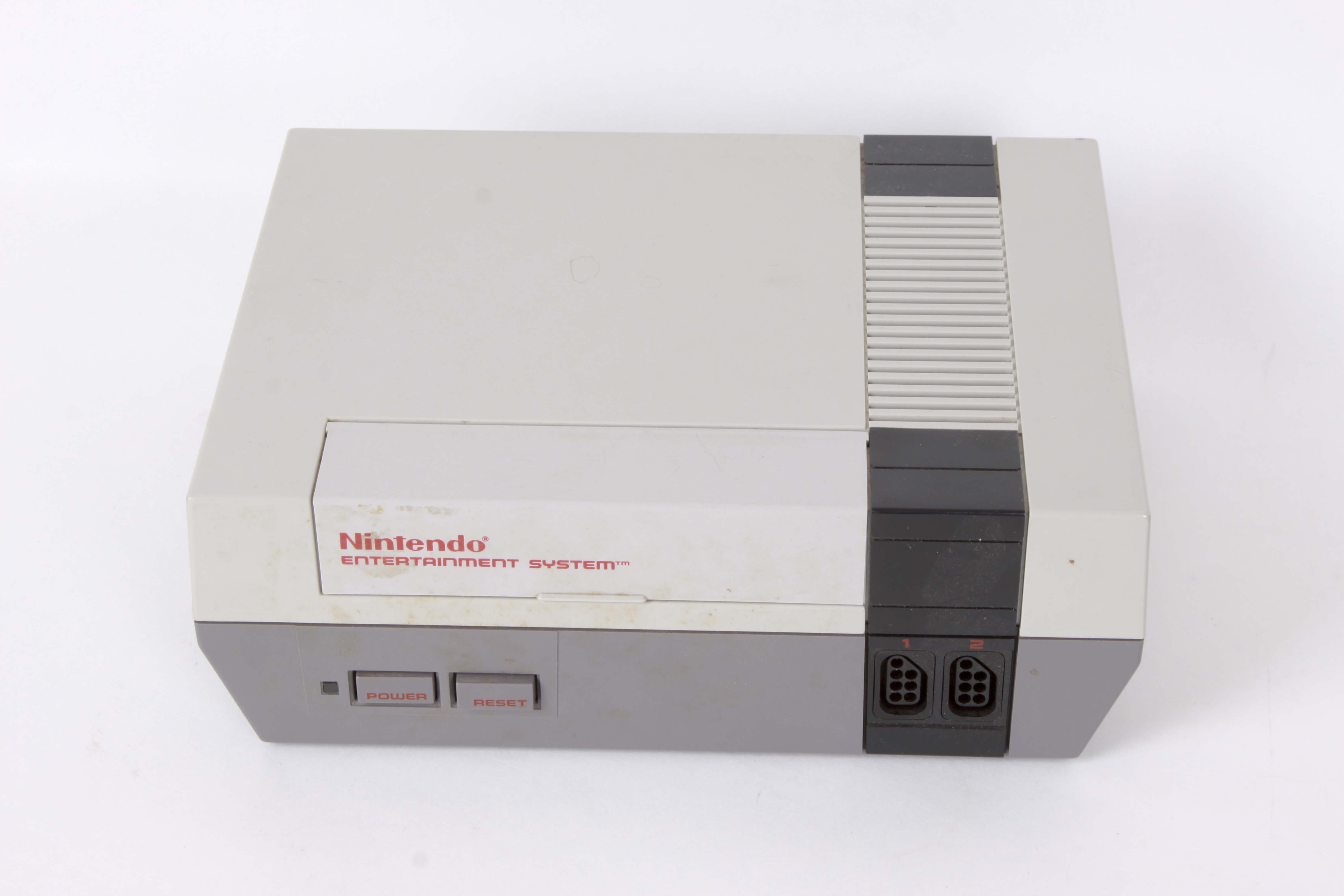 Vintage Nintendo NES System with Controllers and Games