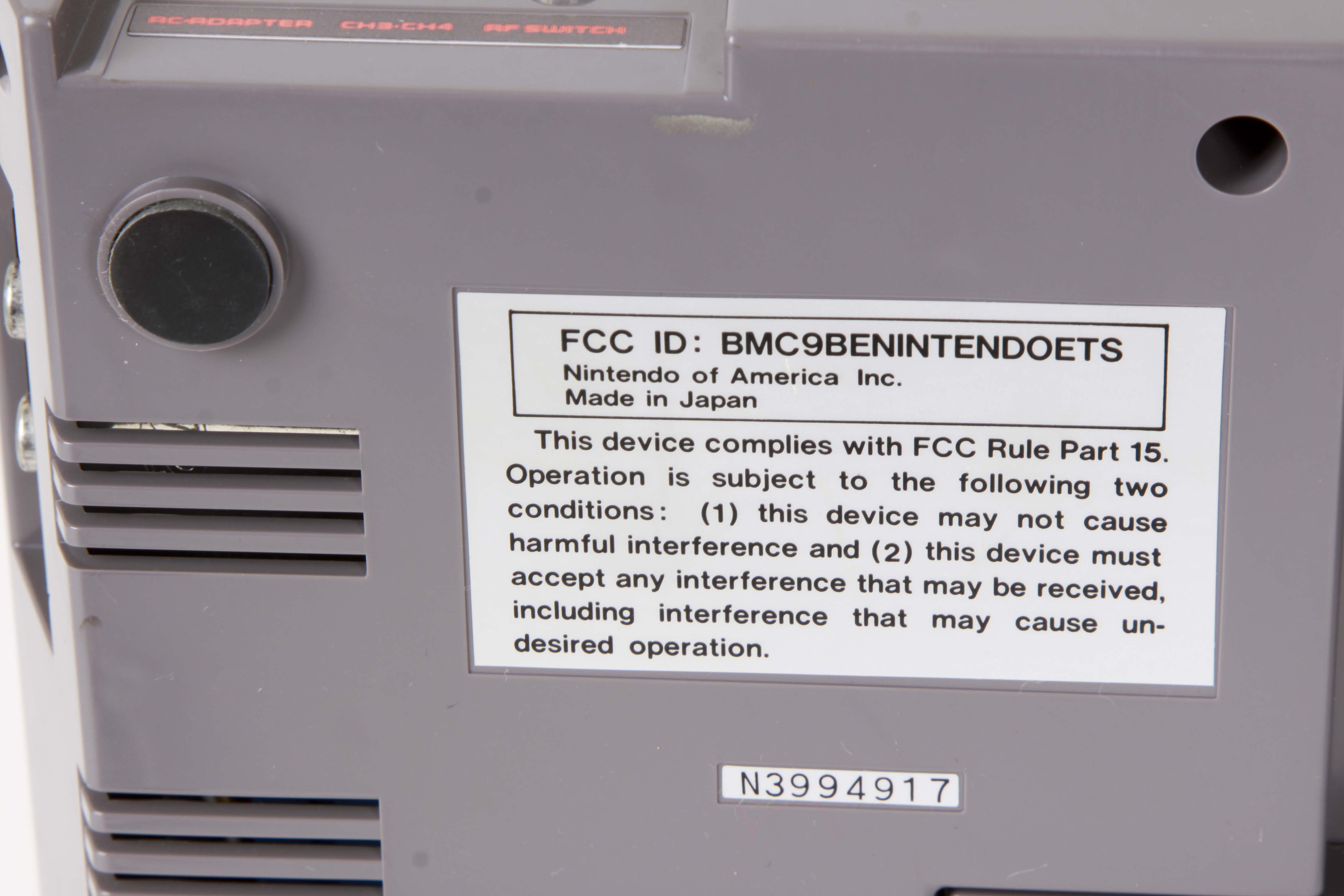 Vintage Nintendo NES System with Controllers and Games