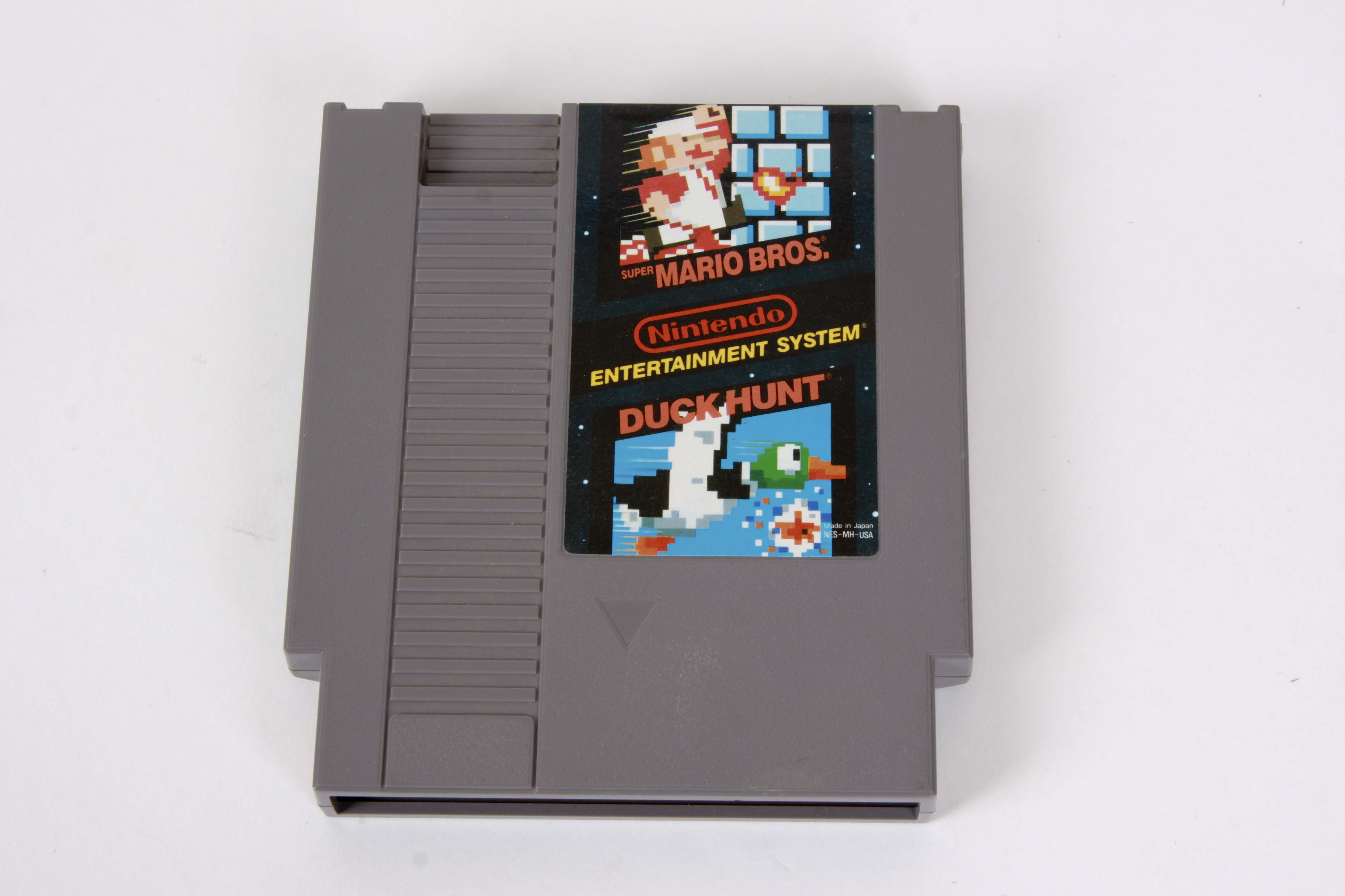 Vintage Nintendo NES System with Controllers and Games