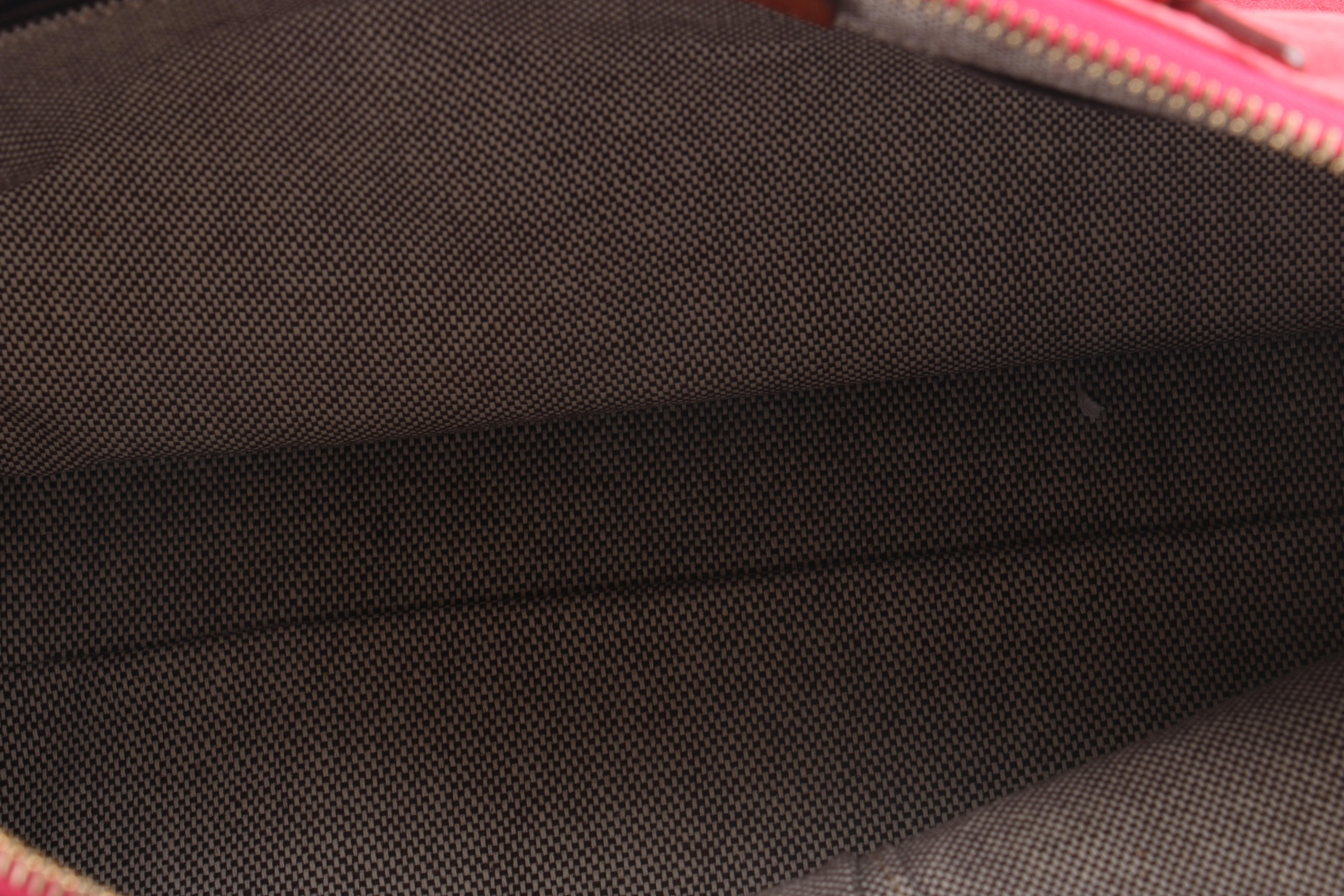 Dooney & Bourke Embossed Handbag