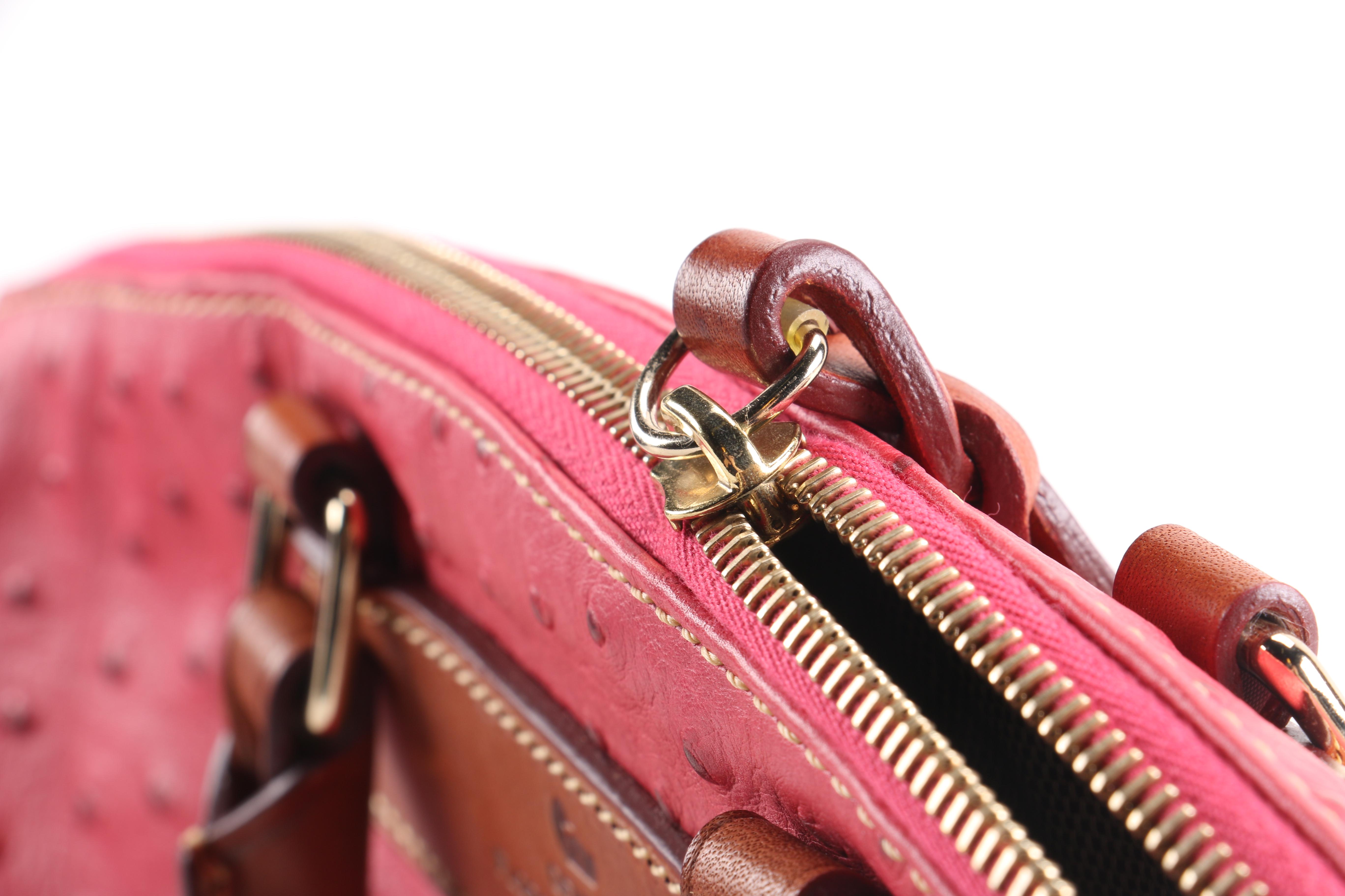 Dooney & Bourke Embossed Handbag