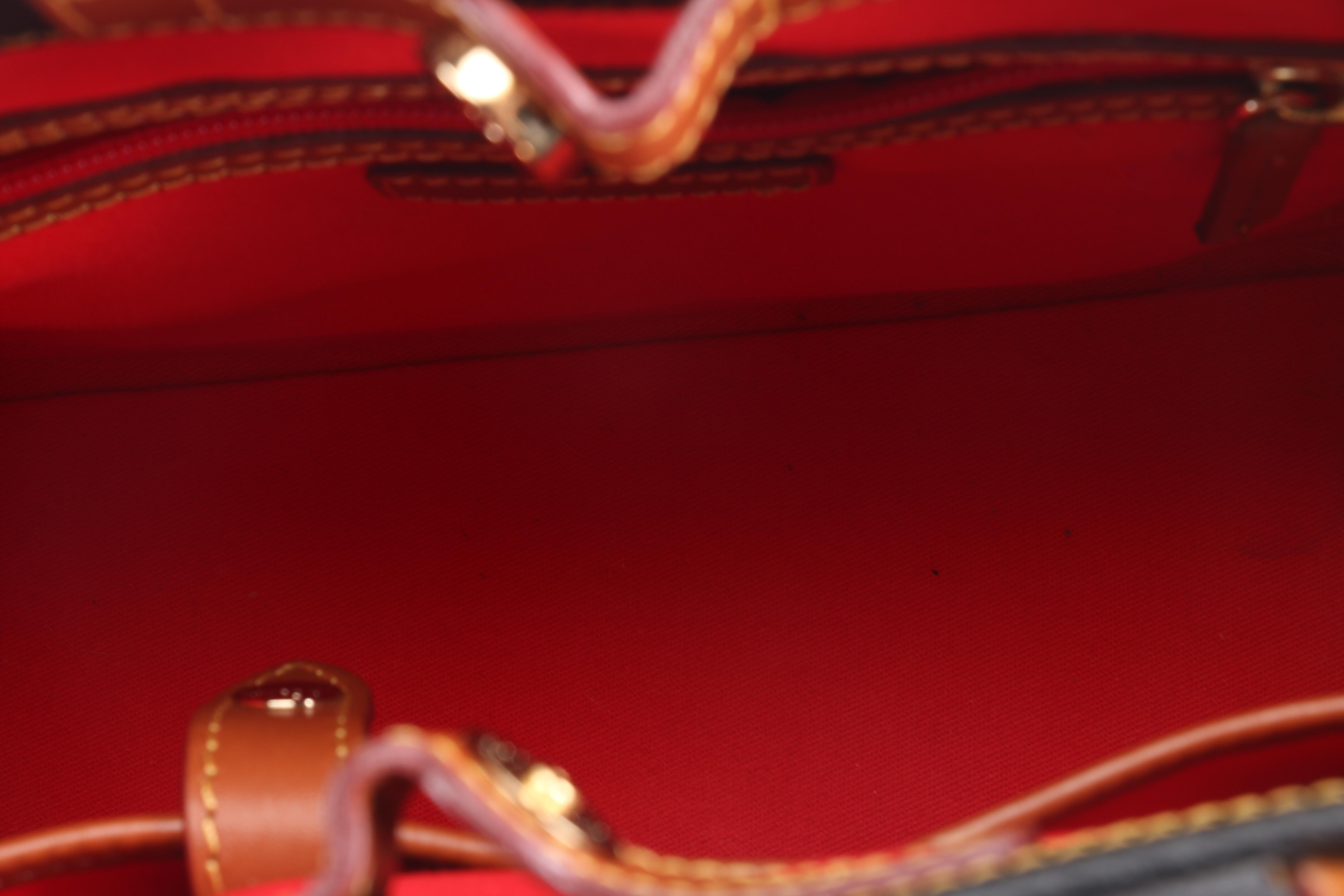 Dooney & Bourke Handbag and Wristlet