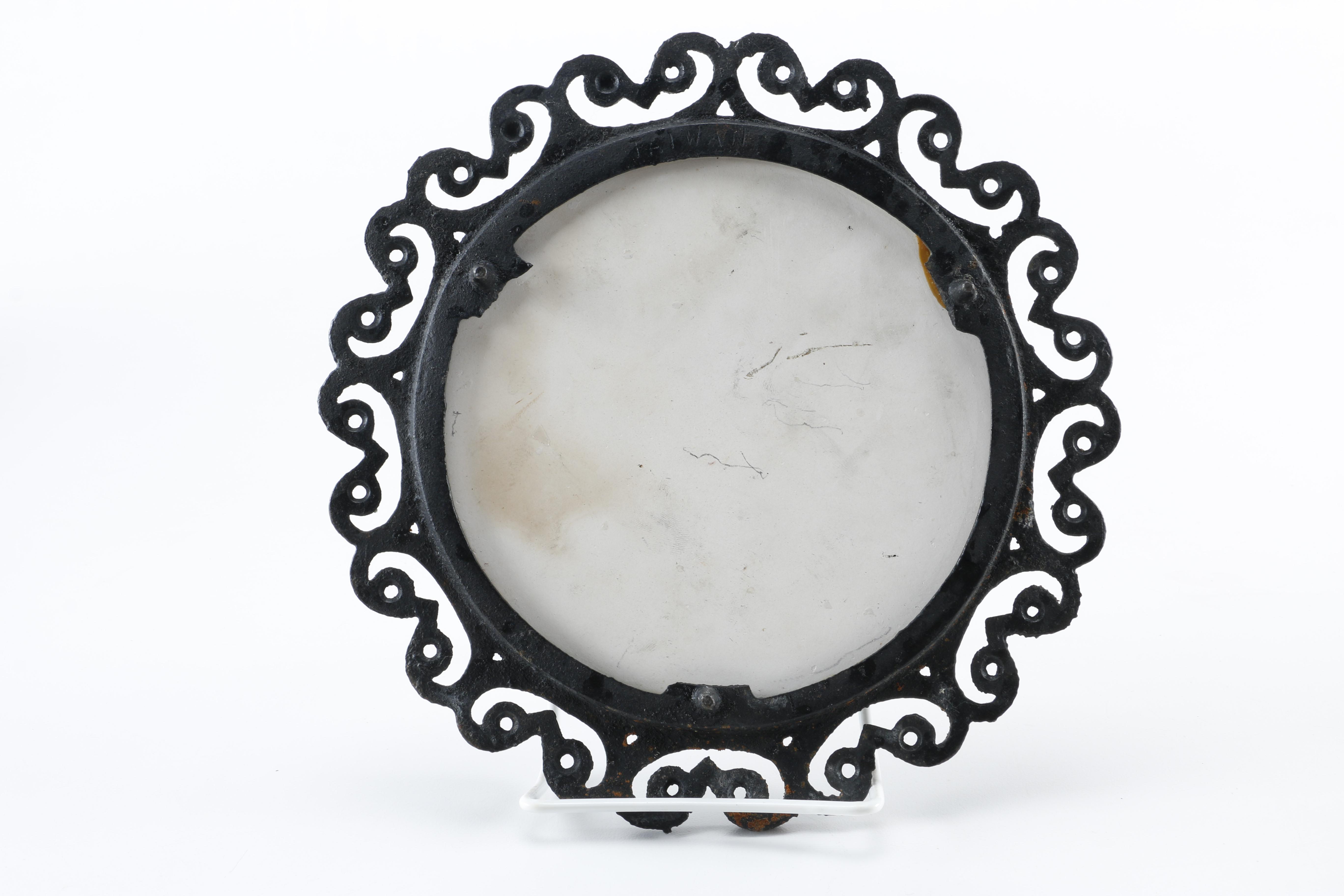 Decorative Cast Iron and Ceramic Trivets