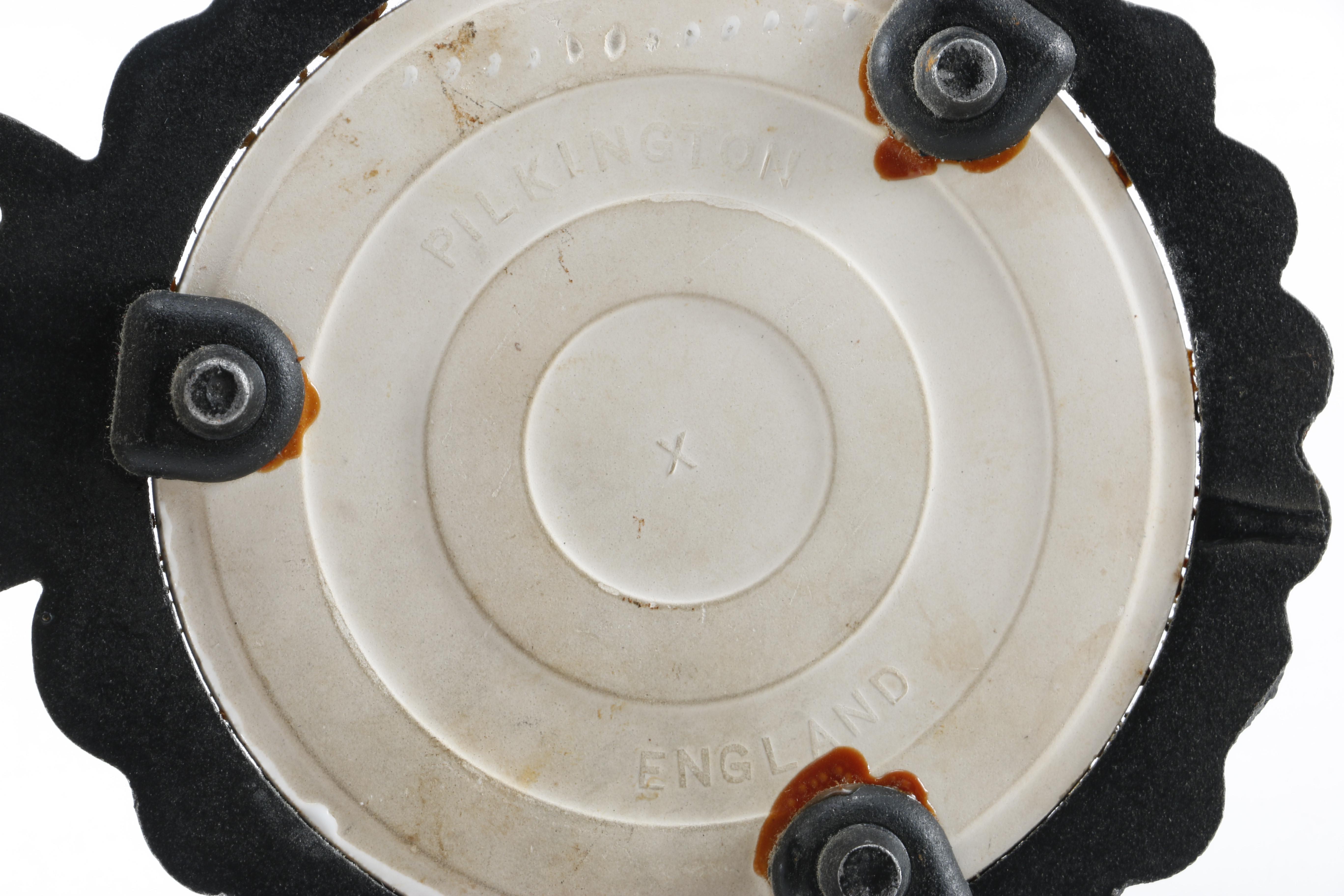 Decorative Cast Iron and Ceramic Trivets