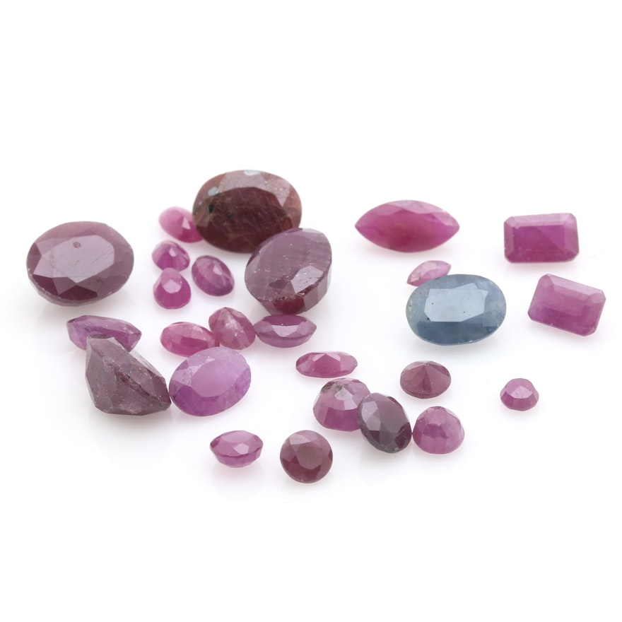 Assortment of Loose Gemstones Featuring Various Rubies and a 1.54 CT Sapphire