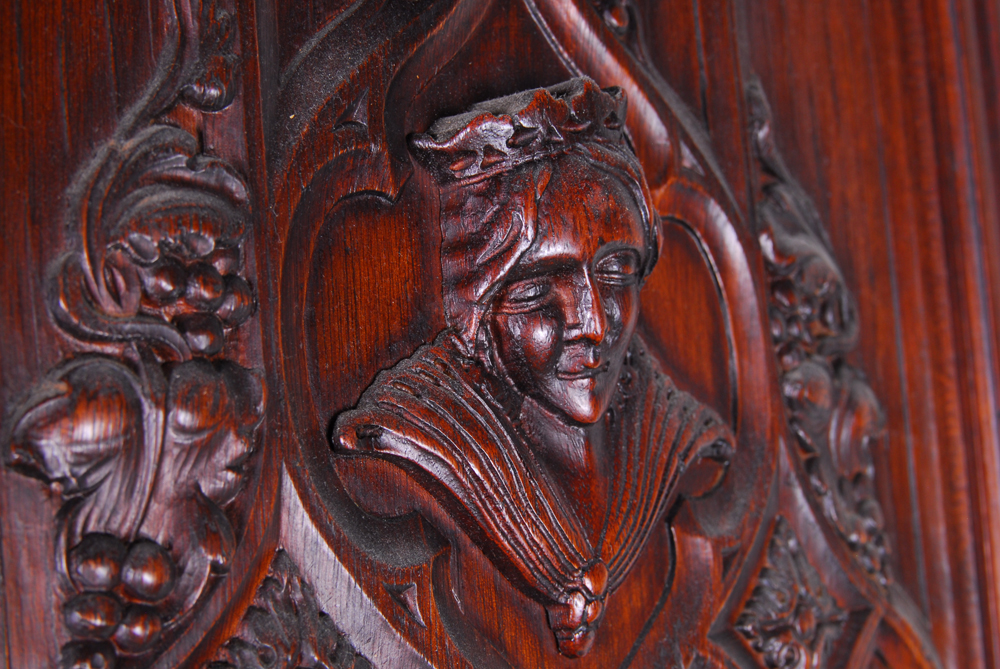 Figural Carved Wood Divider