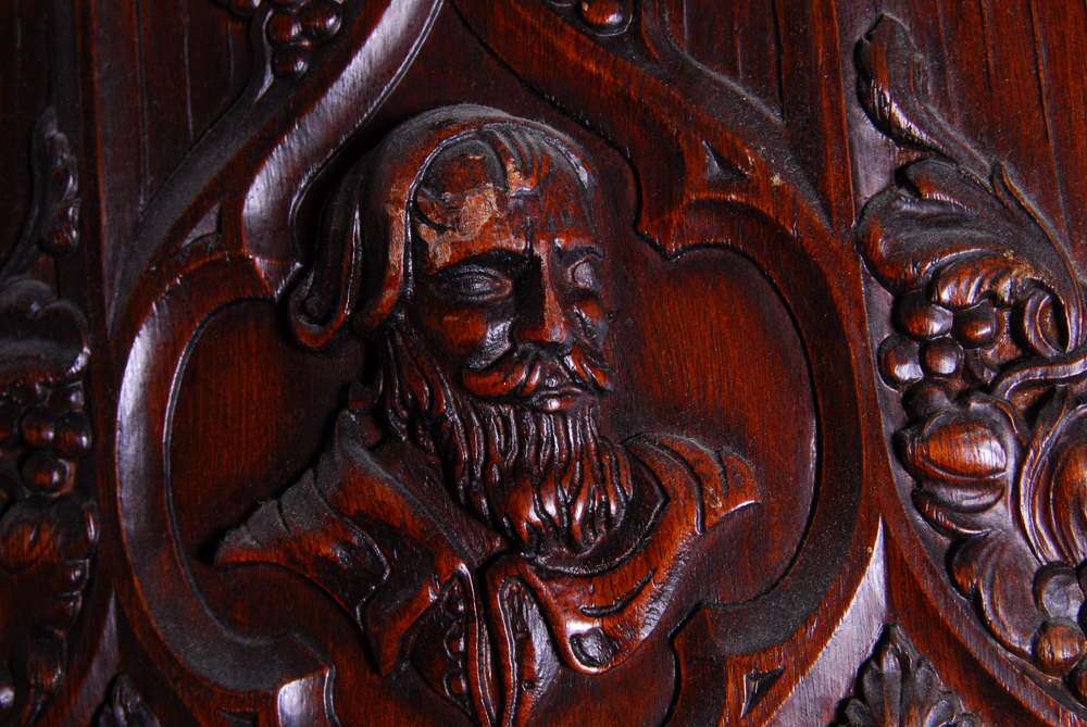 Figural Carved Wood Divider
