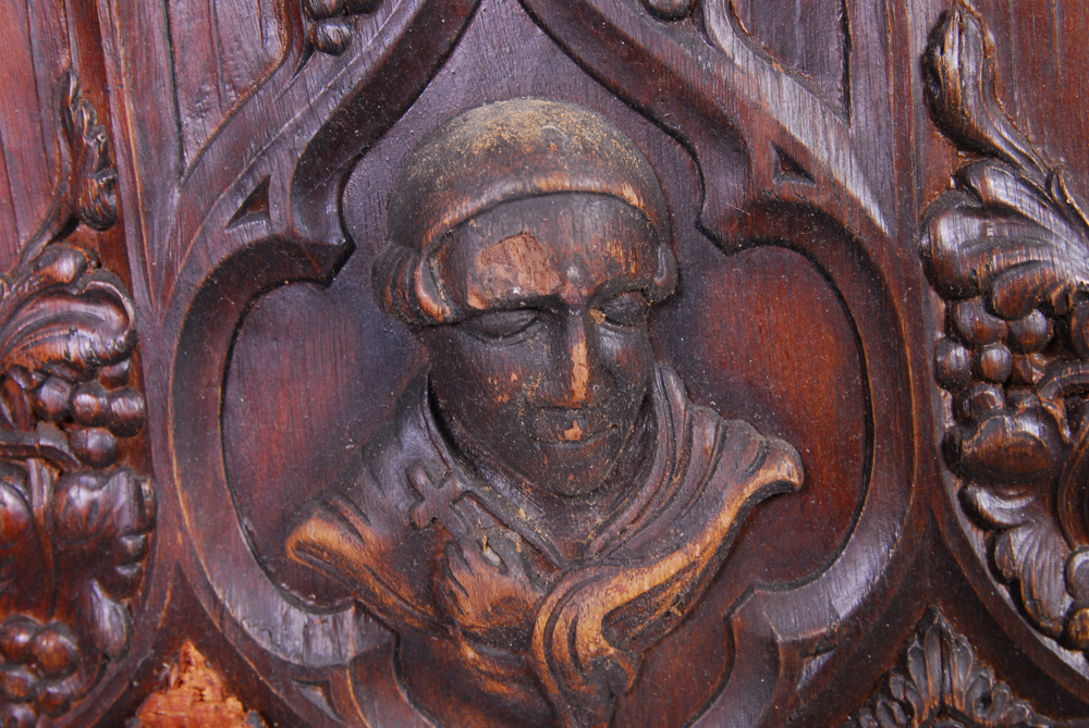 Figural Carved Wood Divider