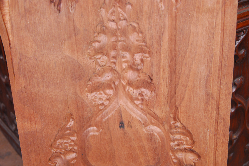 Figural Carved Wood Divider