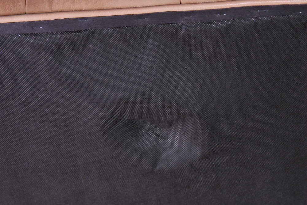 Tufted Leather Ottoman