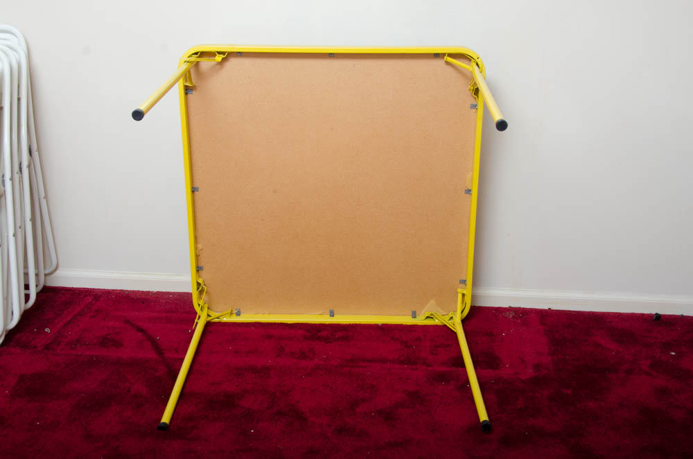 Yellow and White Folding Table With Chairs