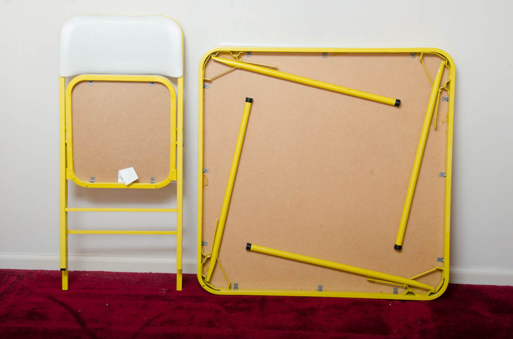 Yellow and White Folding Table With Chairs