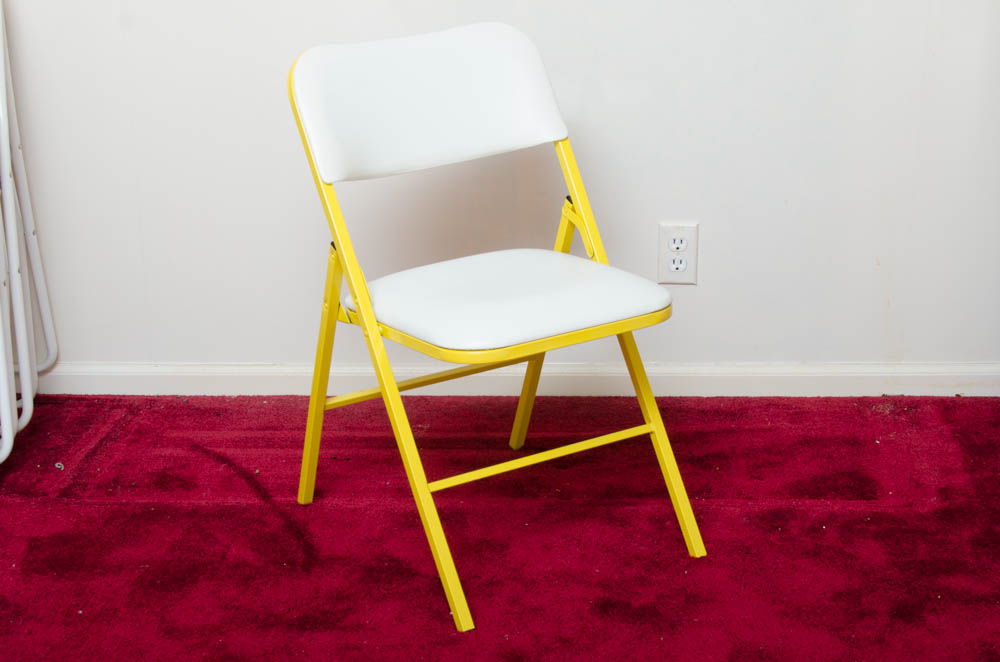 Yellow and White Folding Table With Chairs