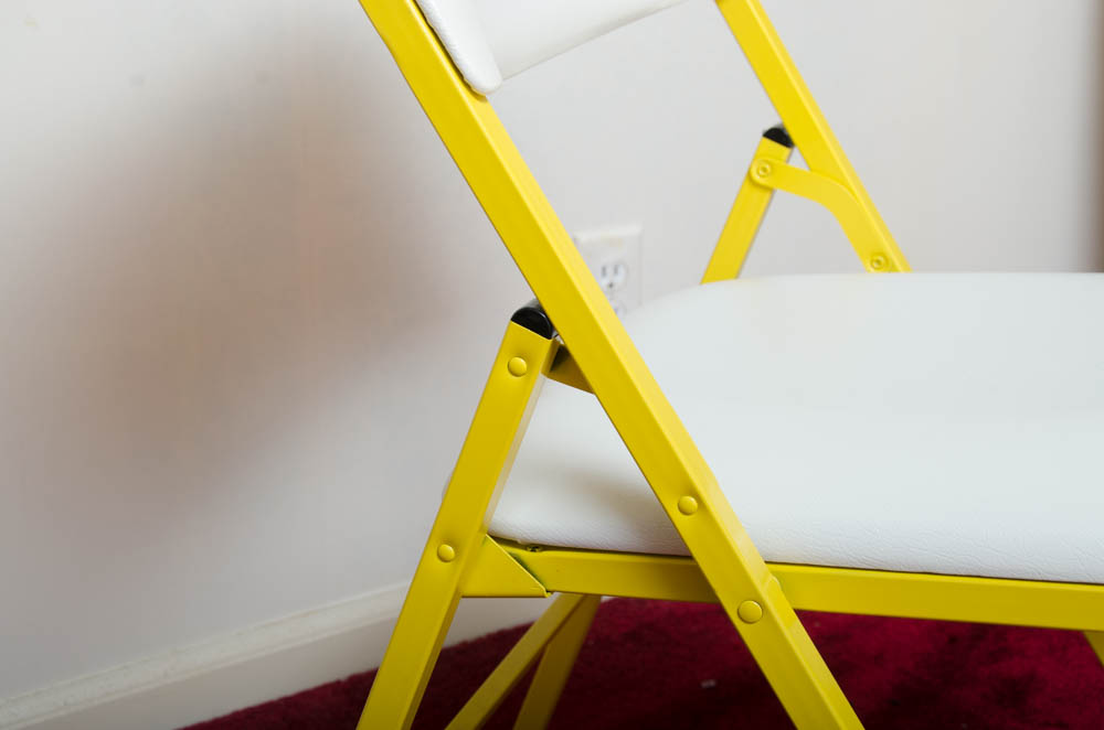 Yellow and White Folding Table With Chairs