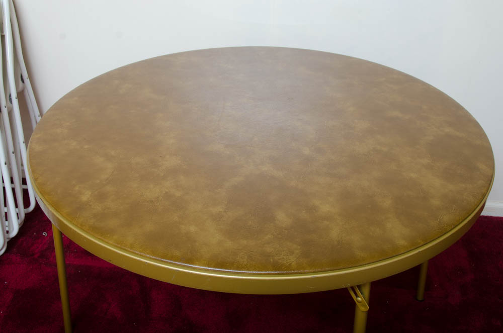 Round Folding Table With White Chairs