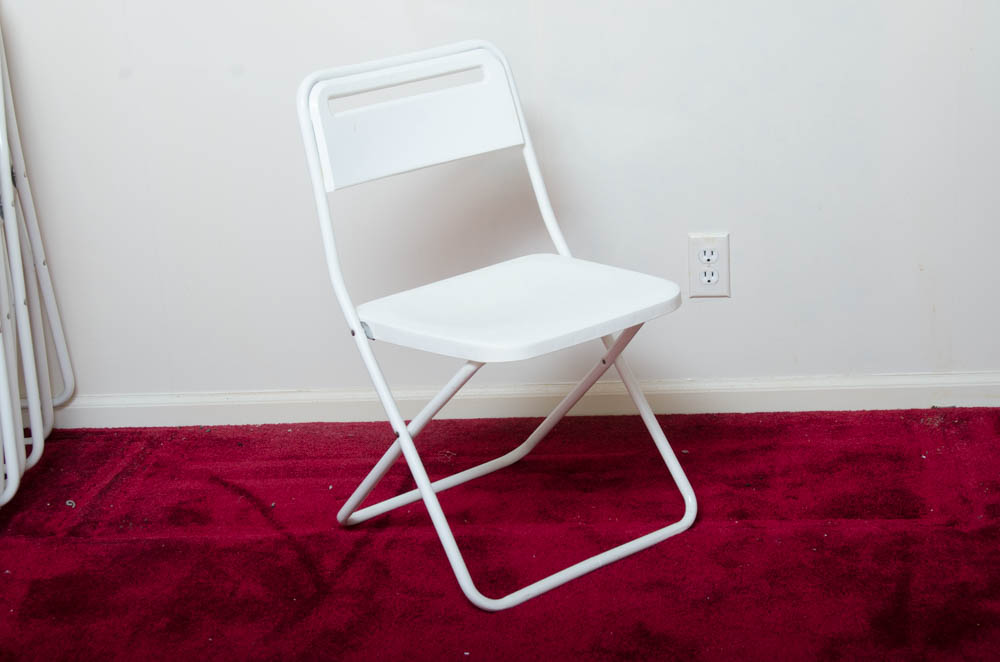 Round Folding Table With White Chairs