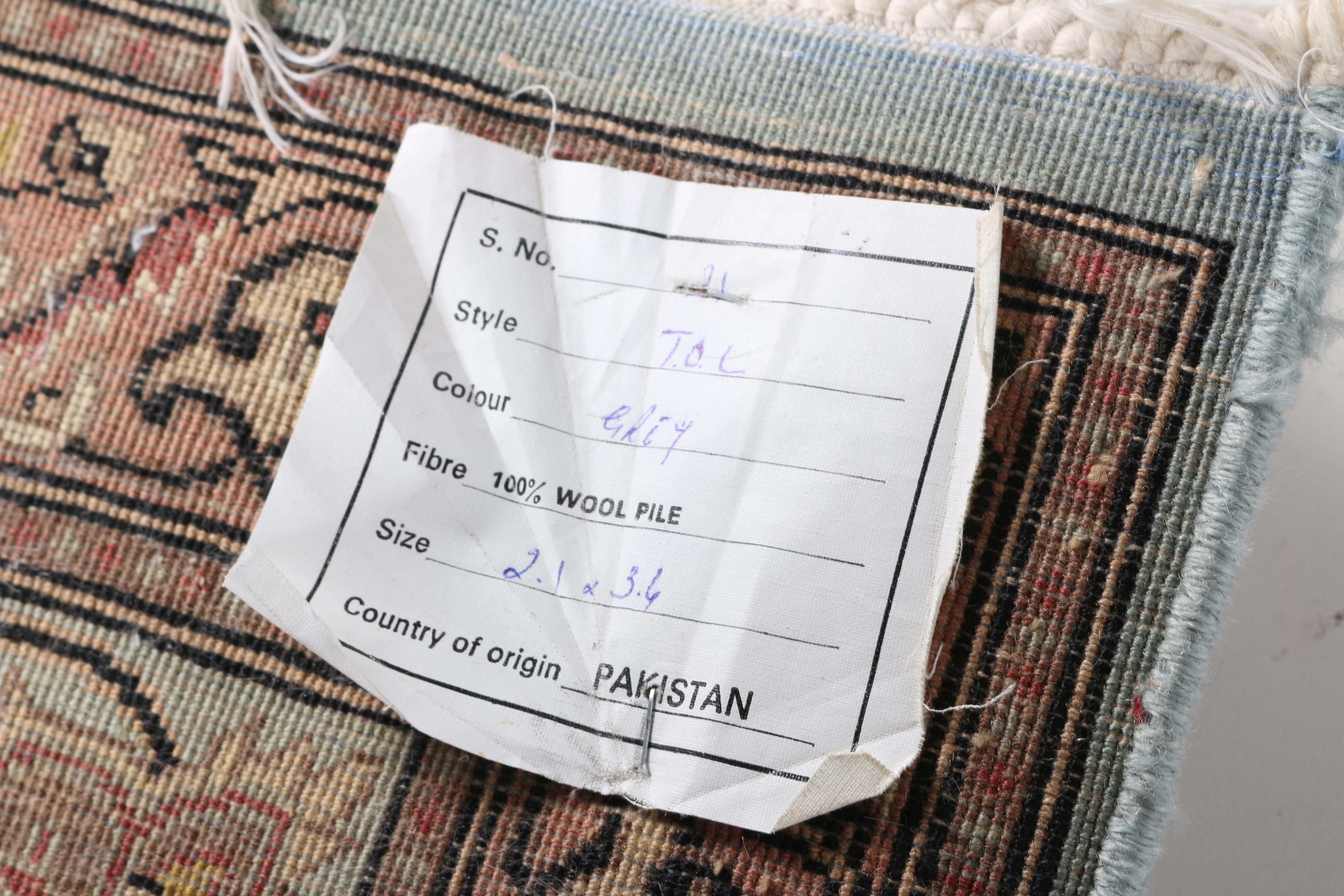 Pakistan Wool Hand Woven Blue and Brown Floral Area Rug