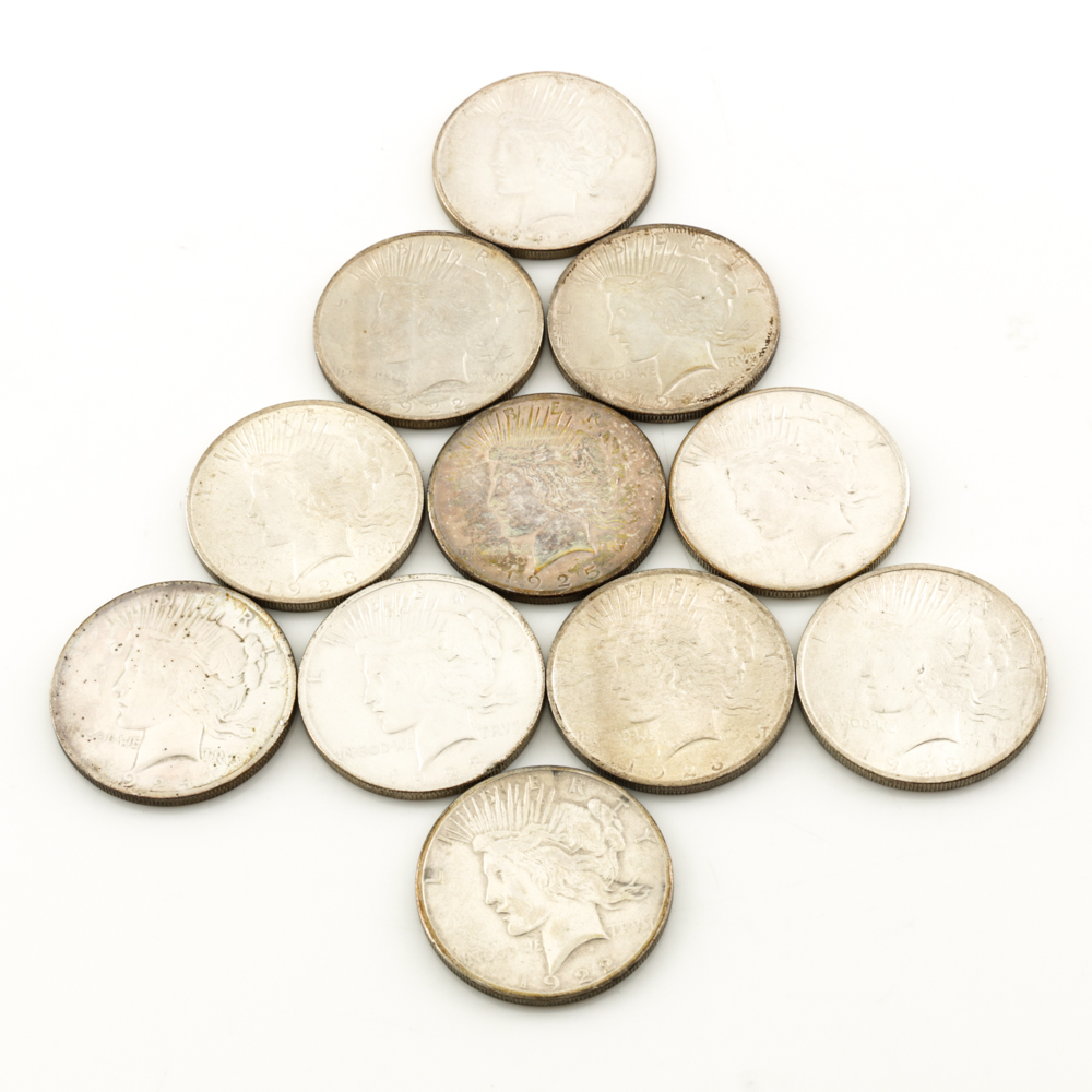 Eleven Peace Silver Dollars