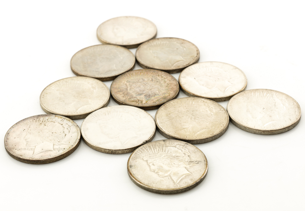 Eleven Peace Silver Dollars