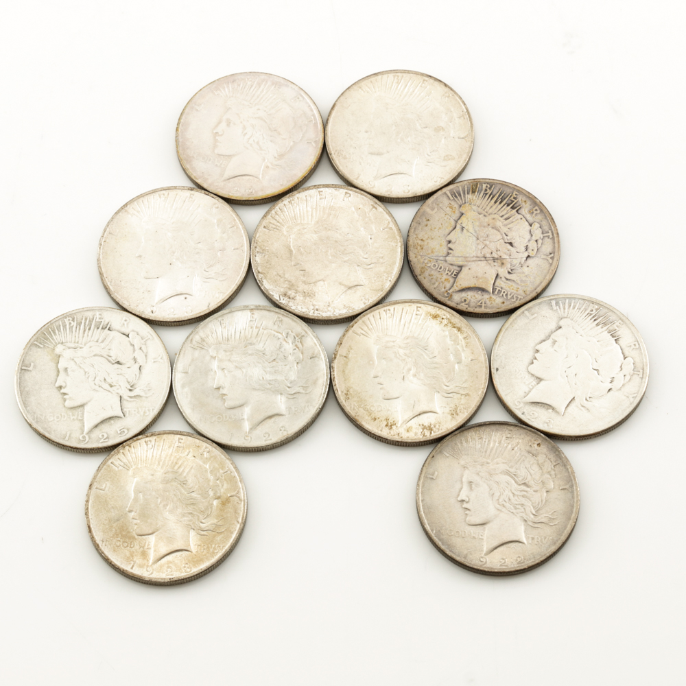 Eleven Peace Silver Dollars