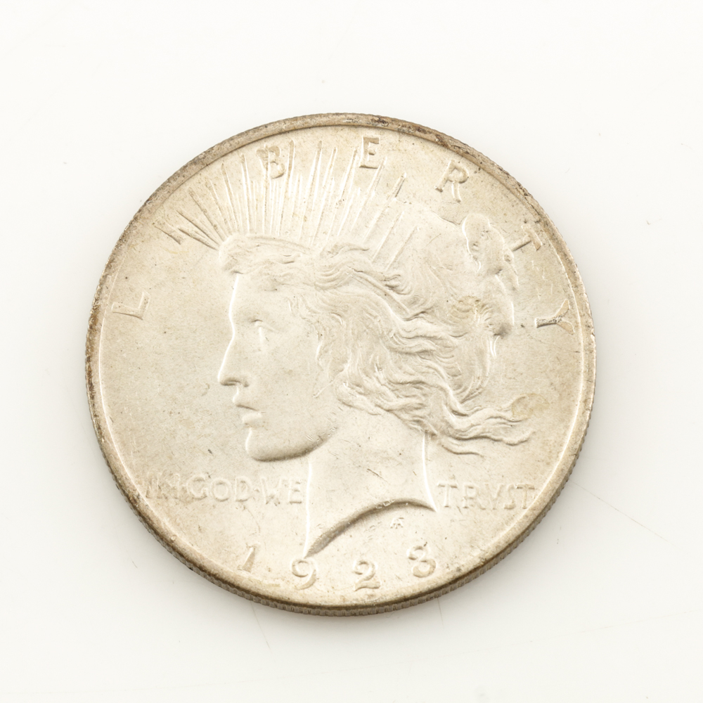 Eleven Peace Silver Dollars