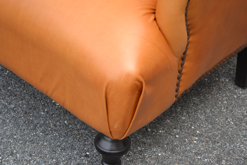 Dark Saffron Leather Armchair and Ottoman